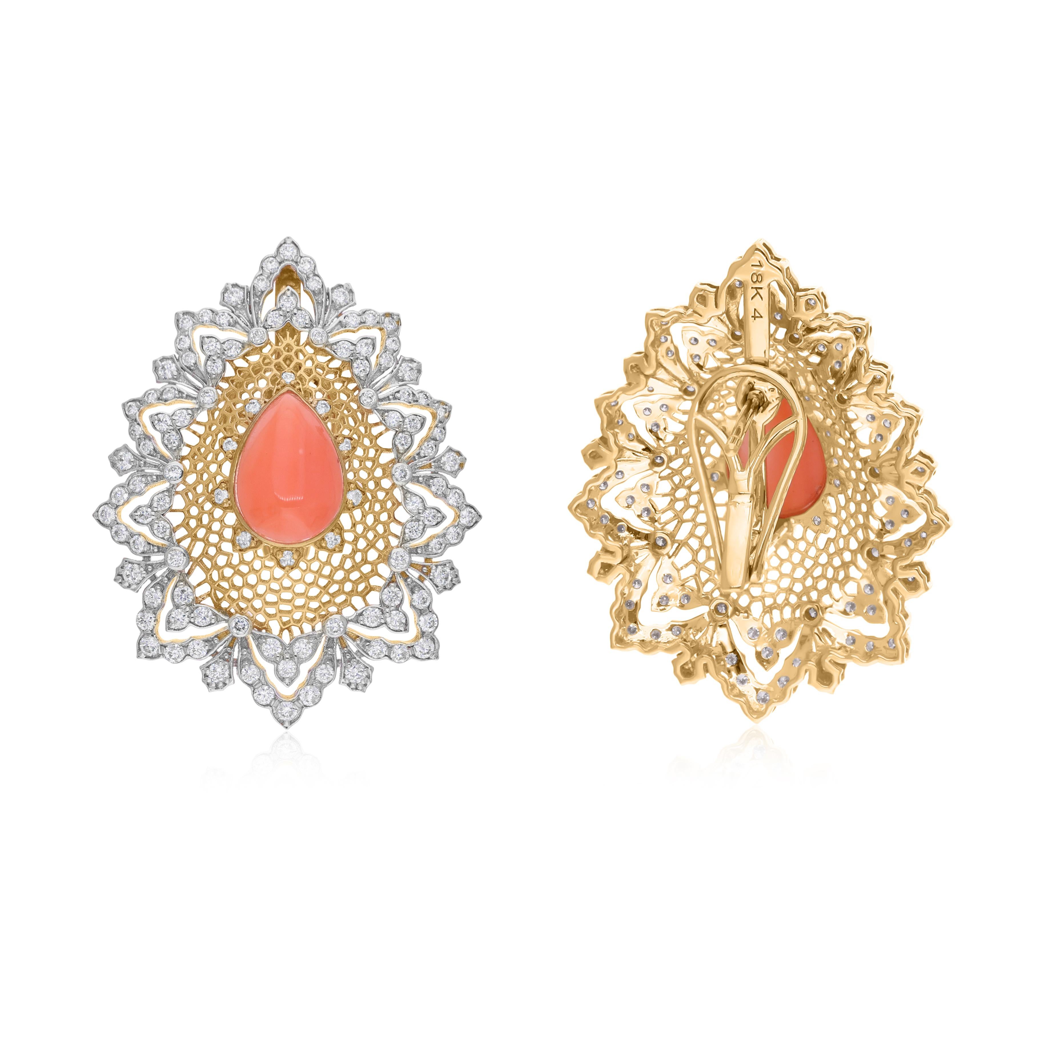 Cast from 18-karat gold, these exquisite earrings are handset with 3.98 carats coral gemstone and 1.62 carats of sparkling diamonds.

FOLLOW SPECTRUM JEWELS storefront to view the latest collection & exclusive pieces. Spectrum Jewels is proudly