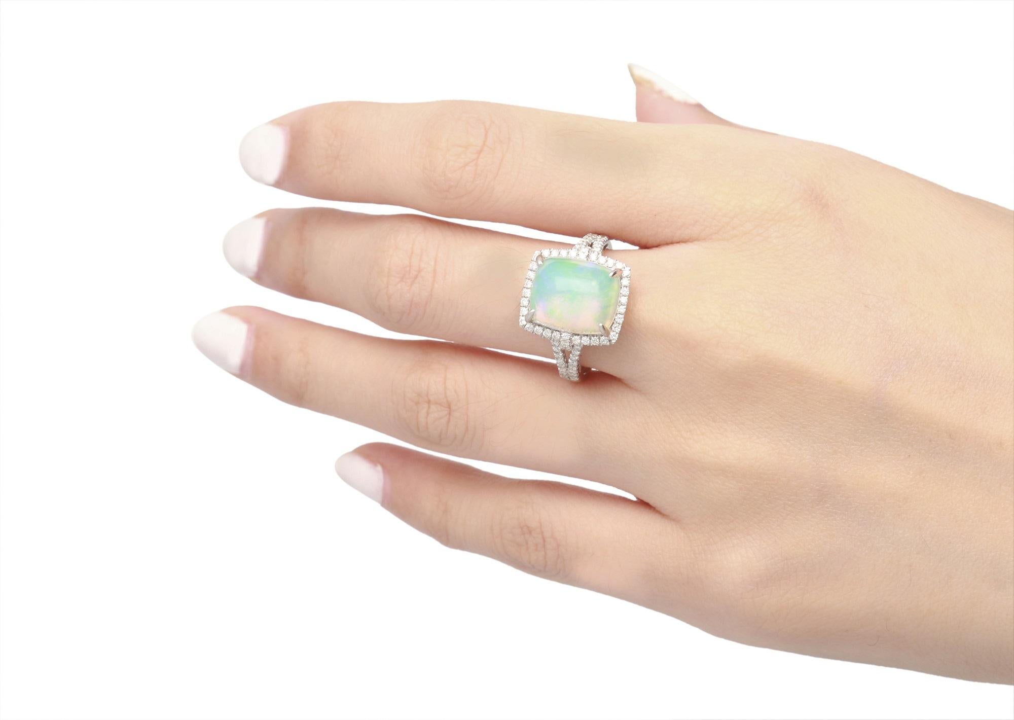 Perfect for your jewelry collection, the Ring showcases an ornate design by Gin & Grace. This Ring is made up of 14K White gold is polished and showcases ideal Natural Opel gemstones (1 Pc) 3.98 Carat Cushion Cab Prong Setting and Round white