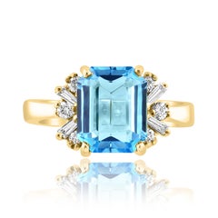 3.98 Carat Emerald Cut Blue Topaz and Diamond Ring in 14K Yellow Gold