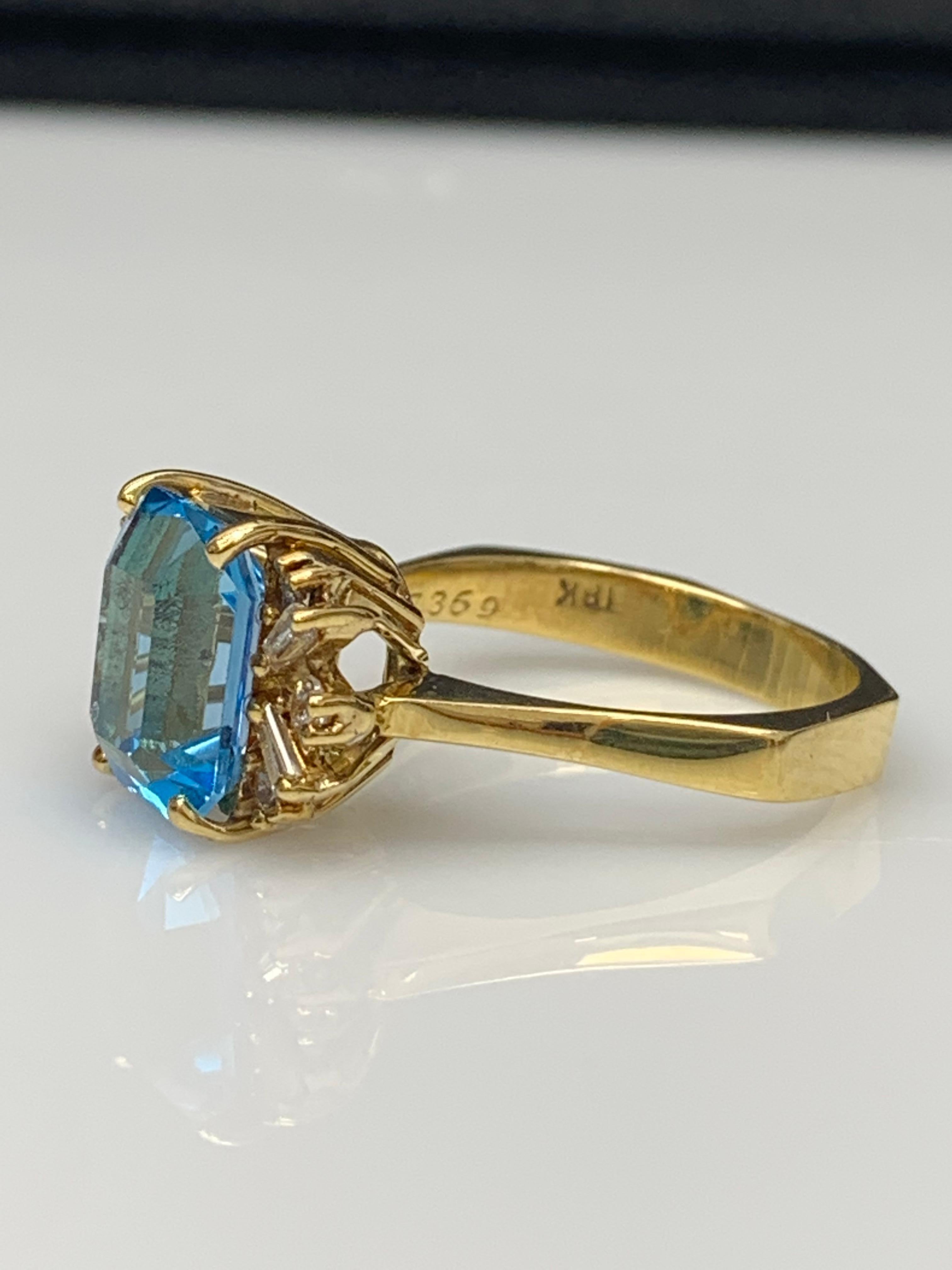 3.98 Carat Emerald Cut Blue Topaz and Diamond Ring in 14K Yellow Gold In New Condition For Sale In NEW YORK, NY