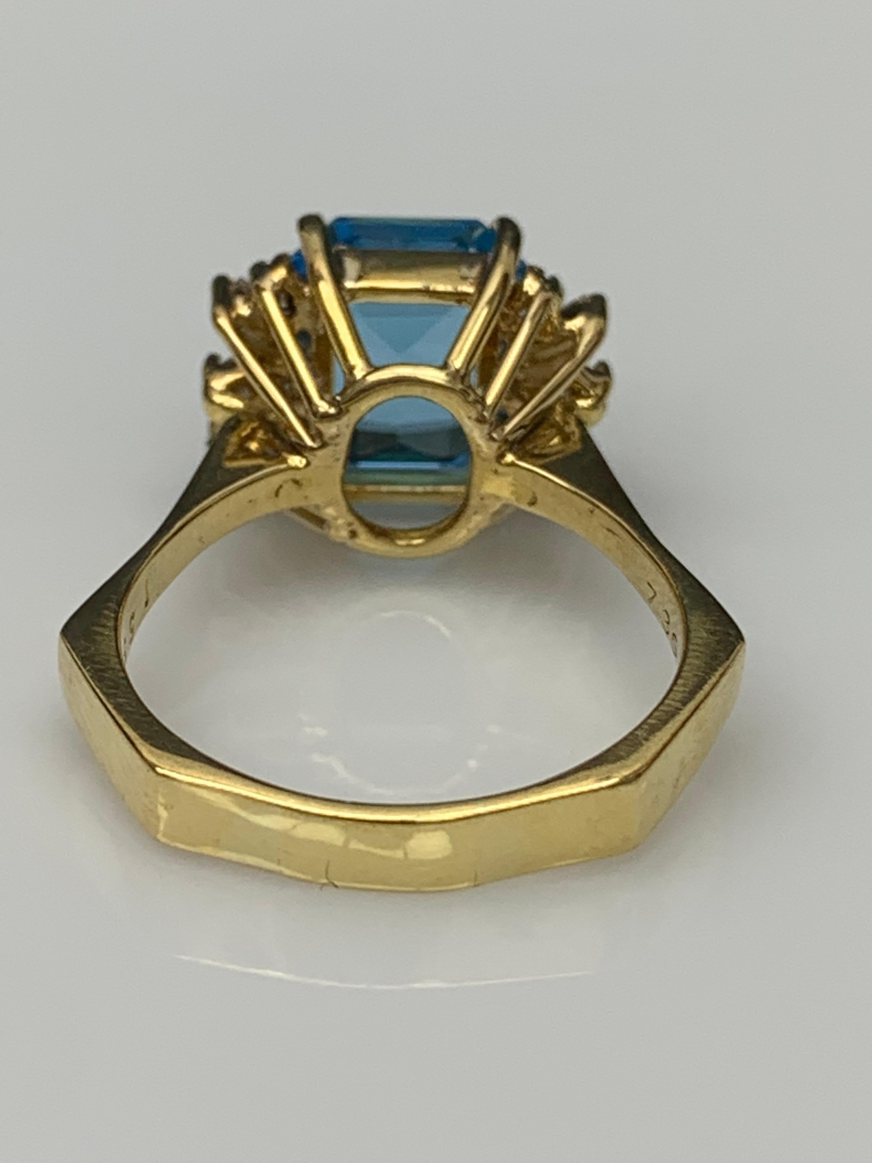Women's 3.98 Carat Emerald Cut Blue Topaz and Diamond Ring in 14K Yellow Gold For Sale