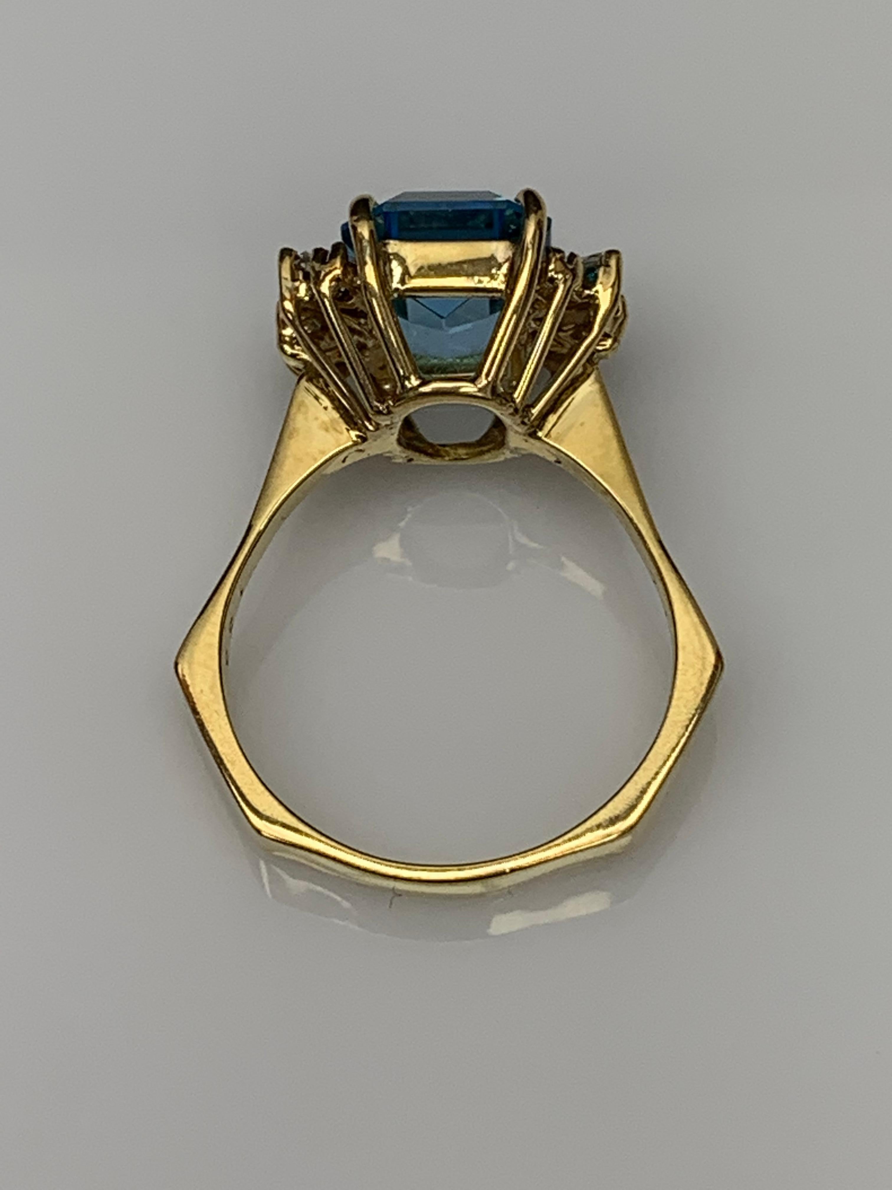 3.98 Carat Emerald Cut Blue Topaz and Diamond Ring in 14K Yellow Gold For Sale 1