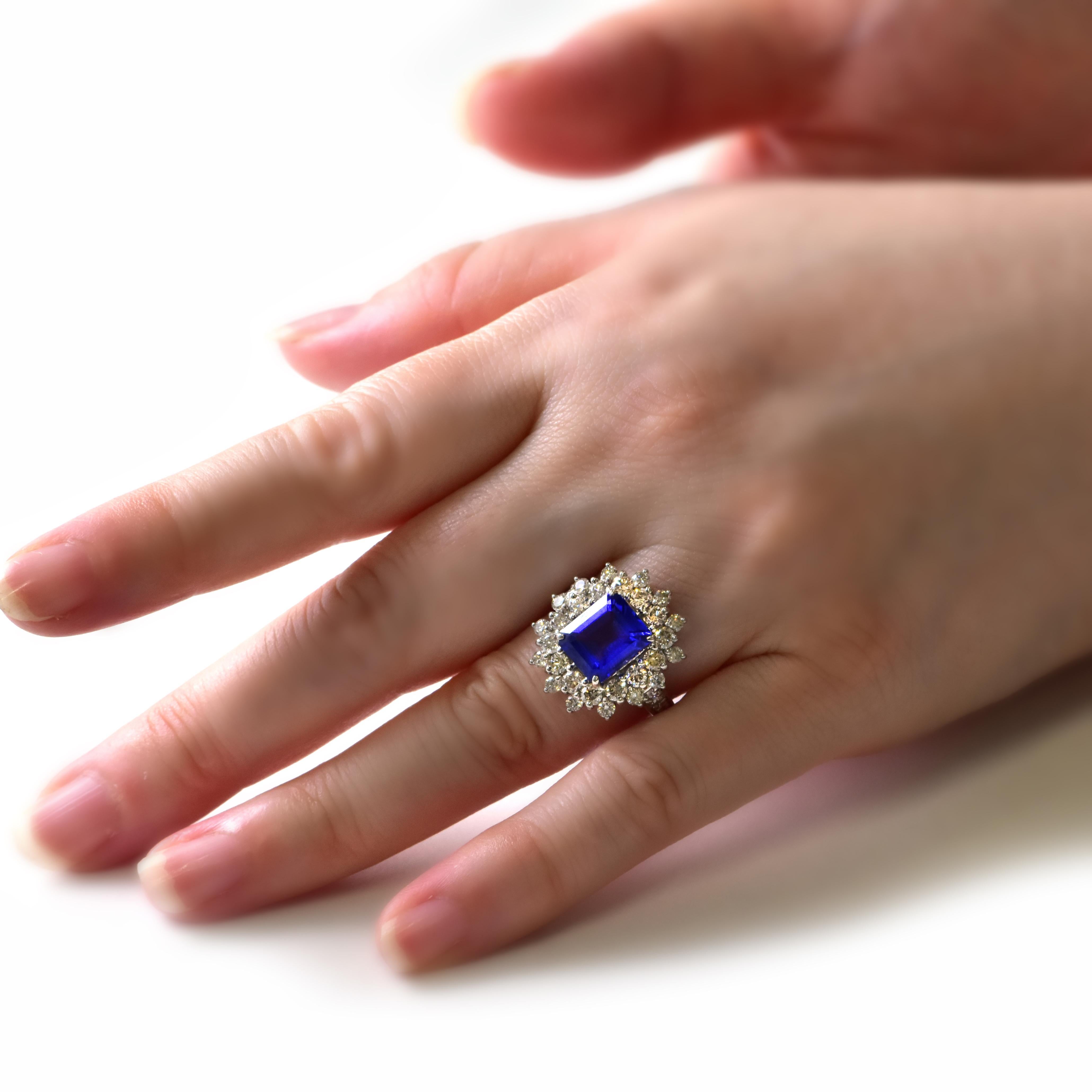Modern 3.98 Carat Natural 'AAA' Tanzanite and Diamond Ring Made in Platinum For Sale