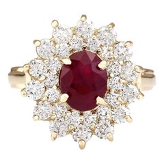 Bague en or jaune 14 carats avec rubis naturel et diamants 