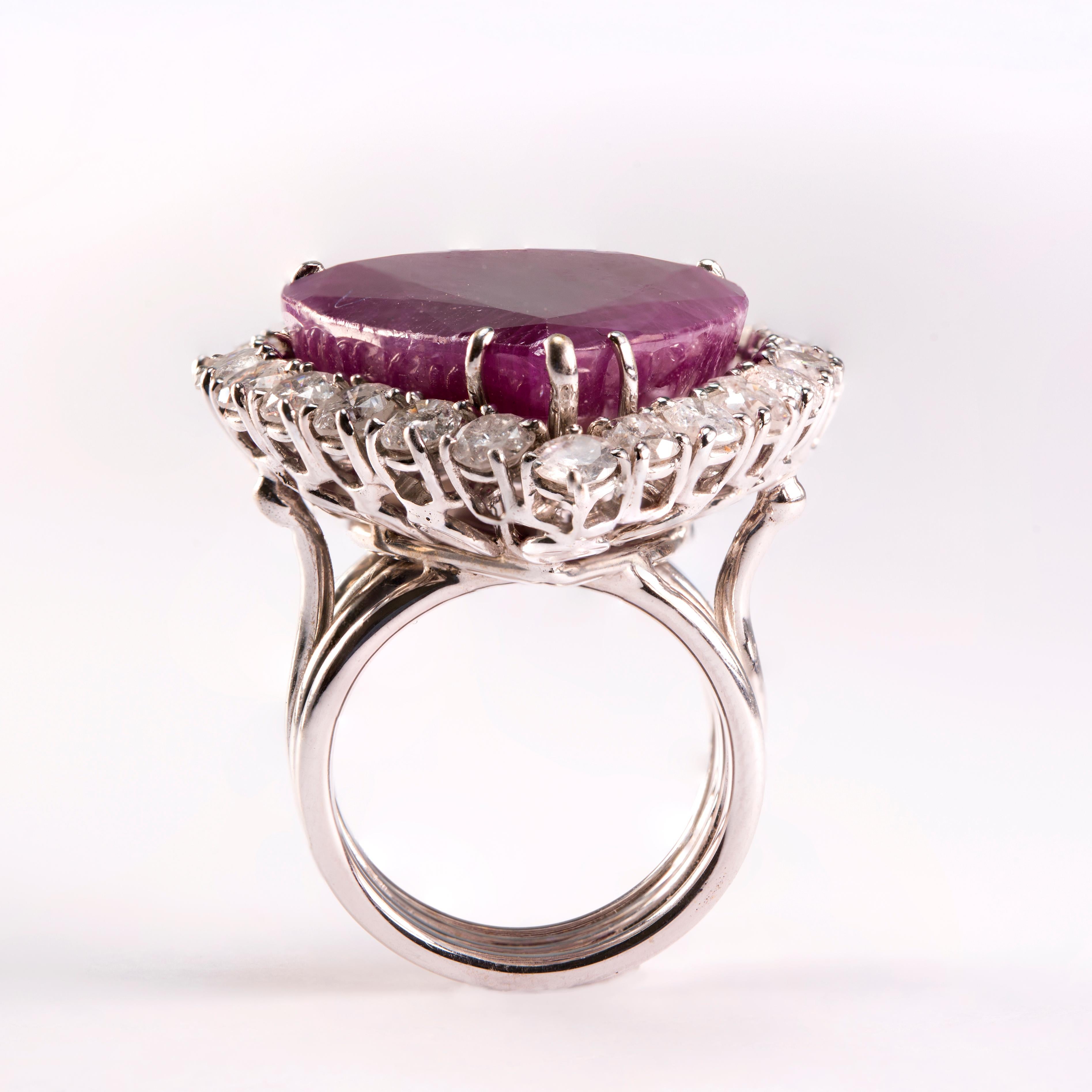 Contemporary 39.82 Carat African Ruby Icy Diamond Cocktail Ring For Sale