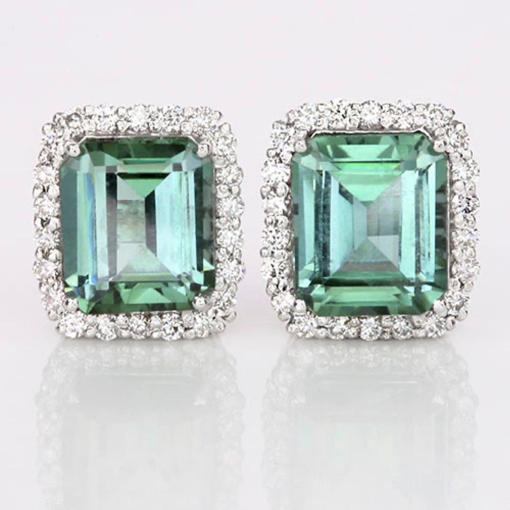 Mint Green Tourmaline & Diamond Halo Earrings

Creator: Carson Gray Jewels
Ring Size: N/A
Metal: 18KT White Gold
Stone: Mint Green Tourmalines & Diamonds
Stone Cut: Matched Pairs Emerald-Step Cut
Weight: Green tourmalines are 3.98 carats; .42 carats