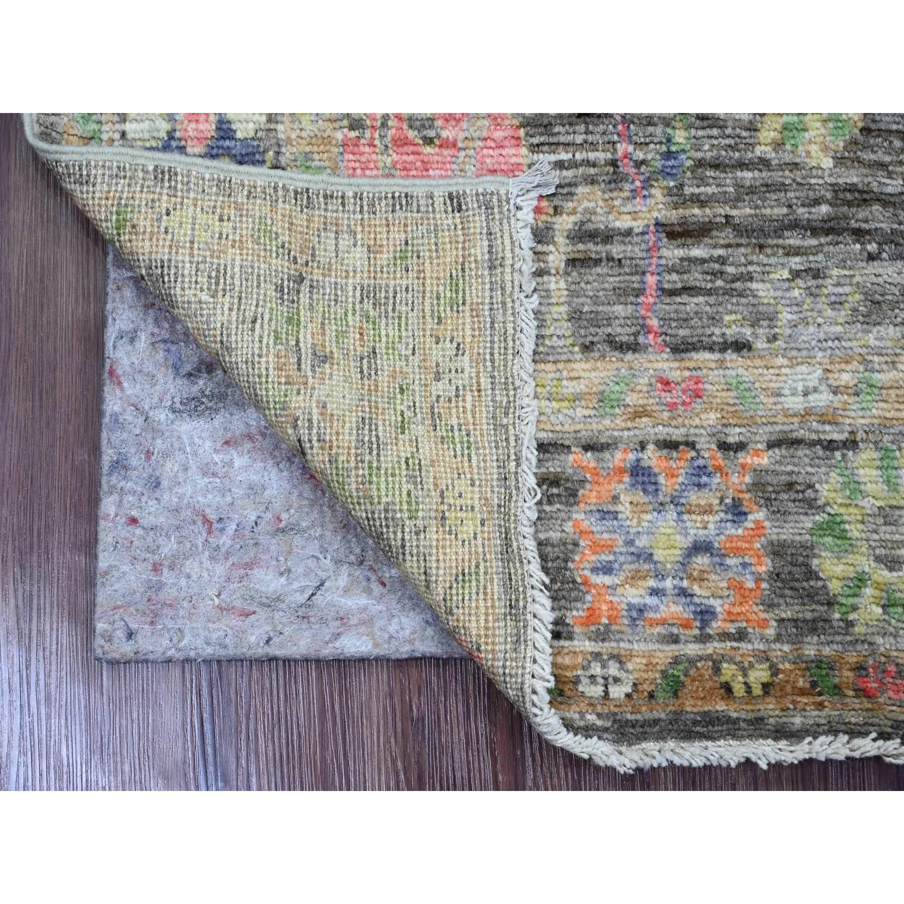 Umber Brown, Hand Knotted, Afghan Angora Oushak with Colorful Leaf Design, Vegetable Dyes, 100% Wool, Oriental Rug
Primary materials: Wool
Latex: No Pile 
height: 0.25 Inches
Style: Transitional
Primary color: Brown
Secondary colors: Orange, Green,