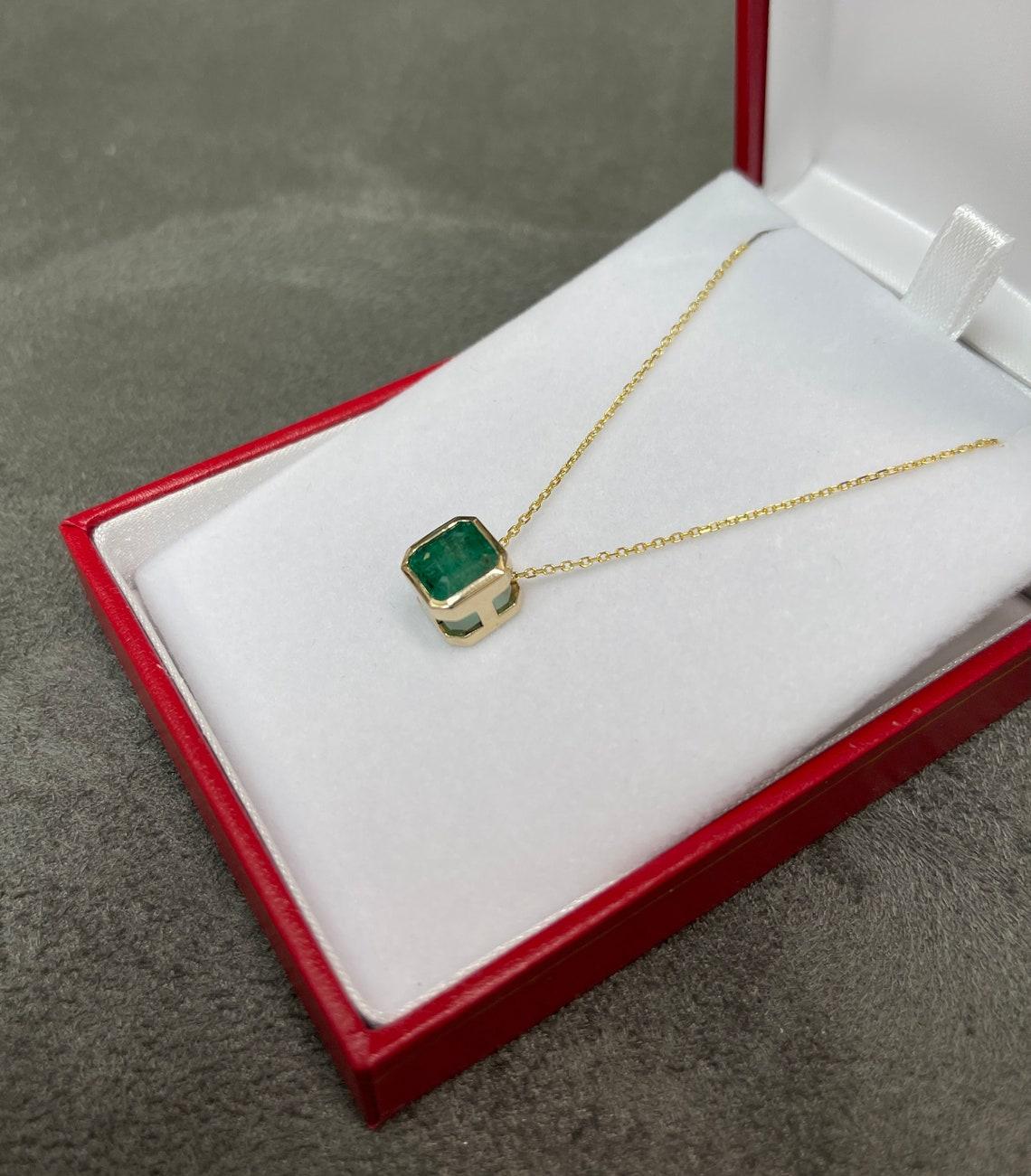 bezel set emerald pendant