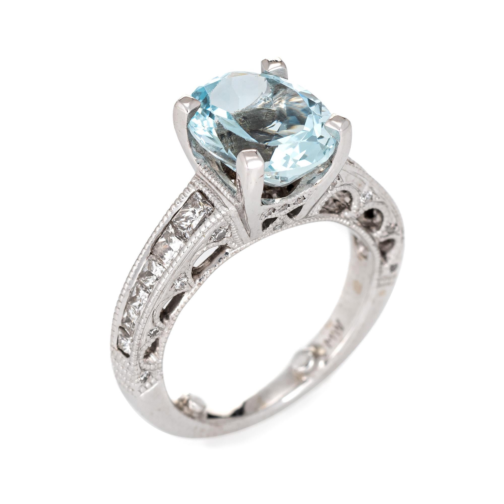 Stylish vintage aquamarine & diamond ring crafted in 18 karat white gold. 

Faceted oval cut aquamarine is estimated at 3 carats, accented with an estimated 0.62 carats of mixed cut diamonds (princess and round cut). The diamonds are estimated at