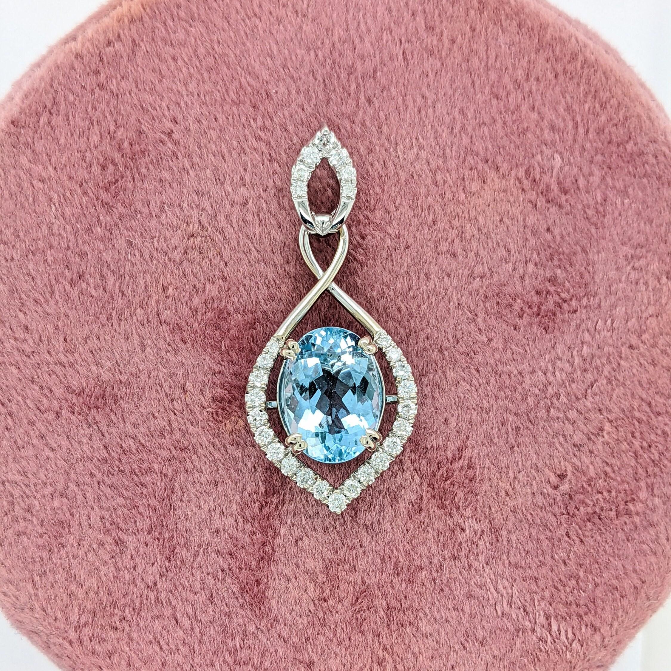 This beautiful pendant features a stunning 3ct sea blue oval aquamarine with natural earth-mined diamonds in solid 14k gold. A lovely design for your daily wear! This pendant also makes a beautiful March birthstone pendant for your loved