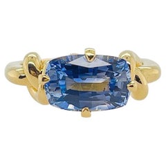 3ct Blue Ceylon Sapphire Cushion Cut Forget Me Knot Ring in 18ct Yellow Gold