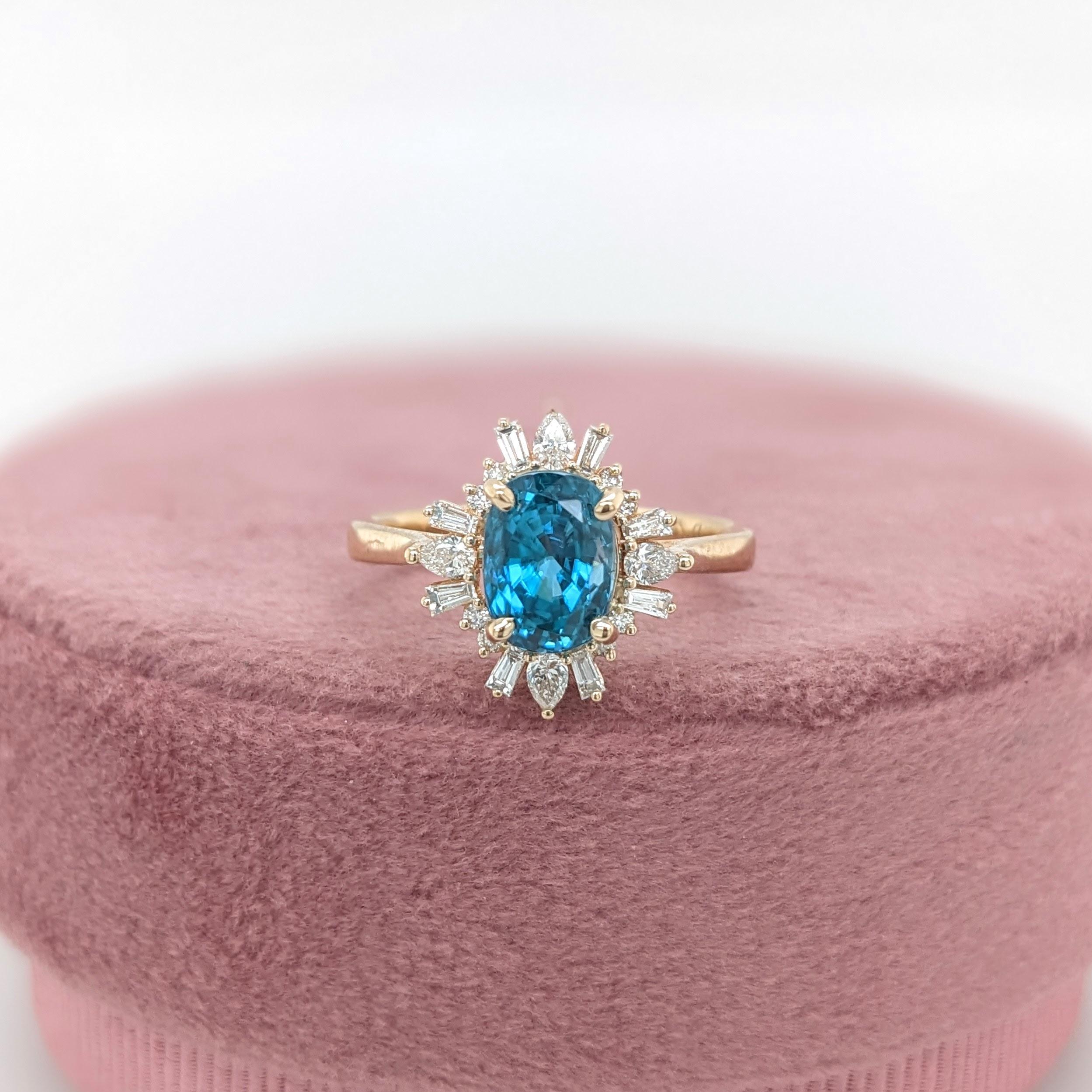 This beautiful ring features a 3.02 carat oval Blue Zircon gemstone with natural earth mined diamonds set in solid 14K gold. This Blue Zircon ring makes a lovely December birthstone gift for your loved ones! 

Specifications

Item Type: Ring
Center