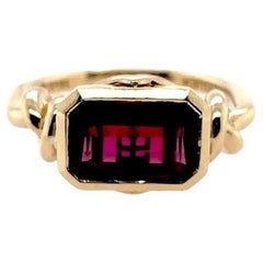 3ct Emerald Cut Rubelite Forget Me Knot Bezel set in 18k