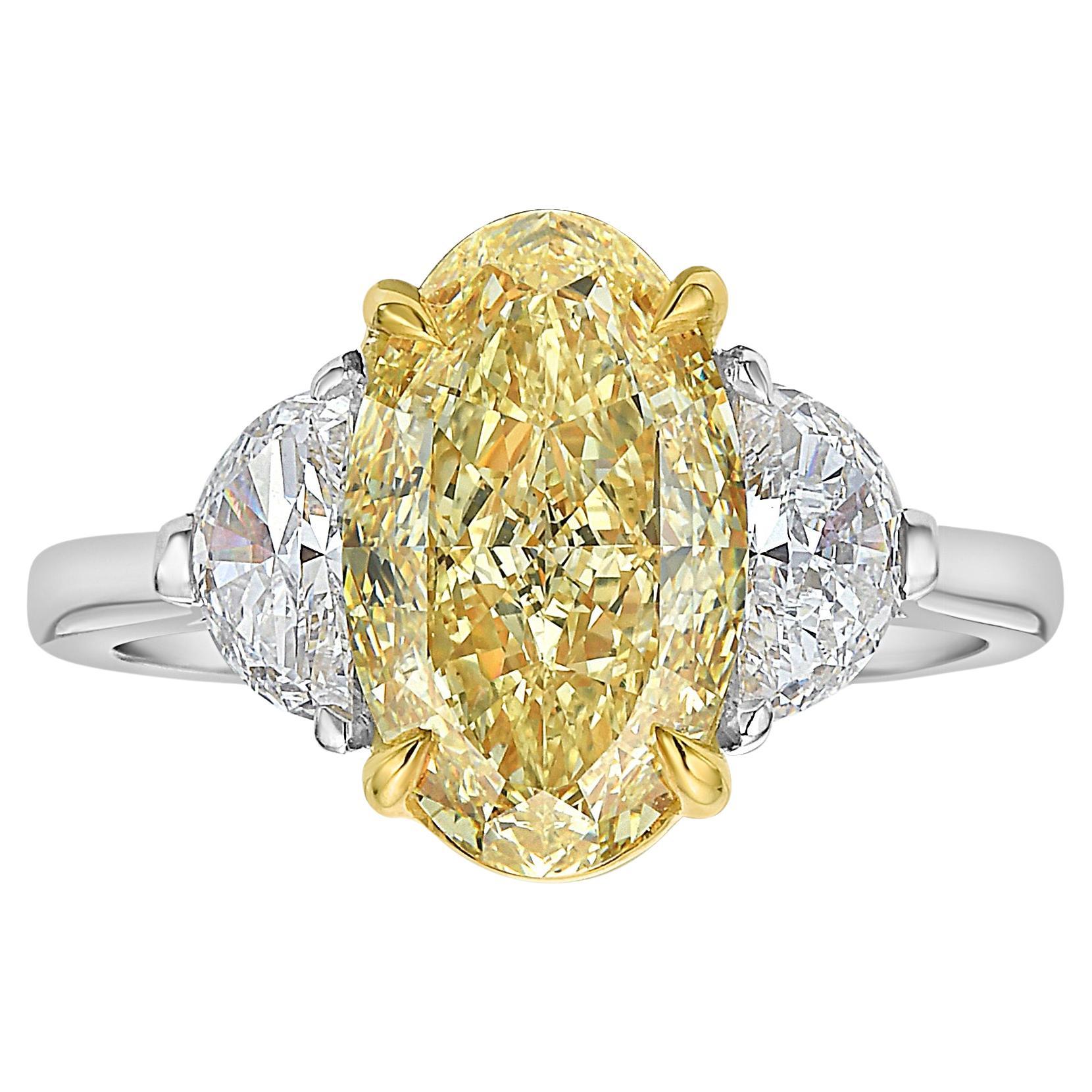 3ct Fancy Intense Yellow Oval Diamond Three Stone Ring