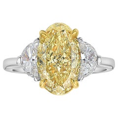 3ct Fancy Intense Yellow Oval Diamond Three Stone Ring