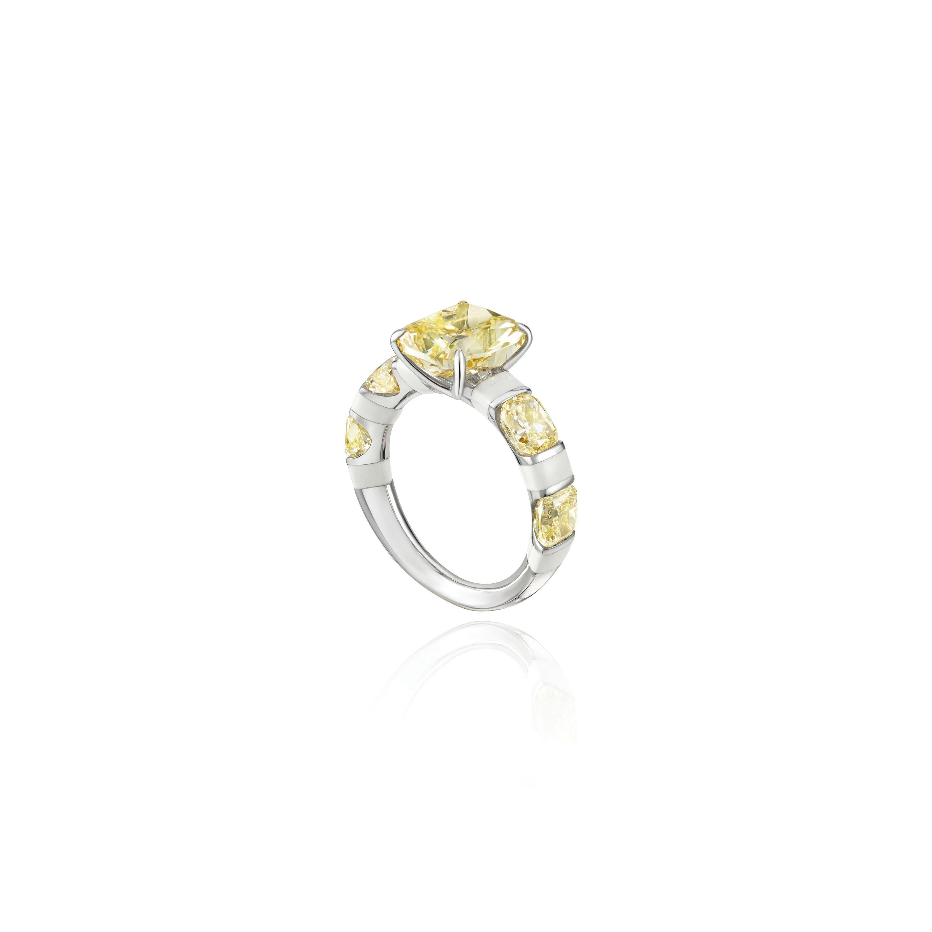 A Fancy Yellow Diamond and Enamel Gold Ring in the Candy Collection by Jewelry Designer, Sarah Ho.	

This 3ct Fancy Intense Yellow is of Natural color origin in a Cushion Modified Brilliant Cut. The GIA certificate states that the clarity is VS2