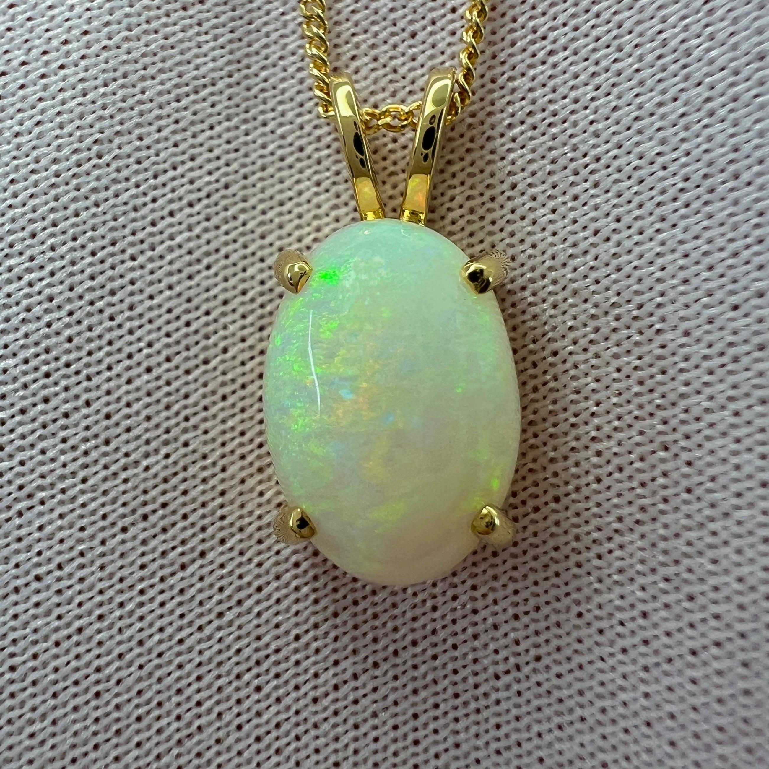 Natural Australian Cooper Pedy White Opal 18k Yellow Gold Solitaire Pendant Necklace.

3.00 Carat opal with beautiful play of colour and an excellent oval cabochon cut. Set in a fine 18k yellow gold 4 claw solitaire pendant. Stunning opal with an