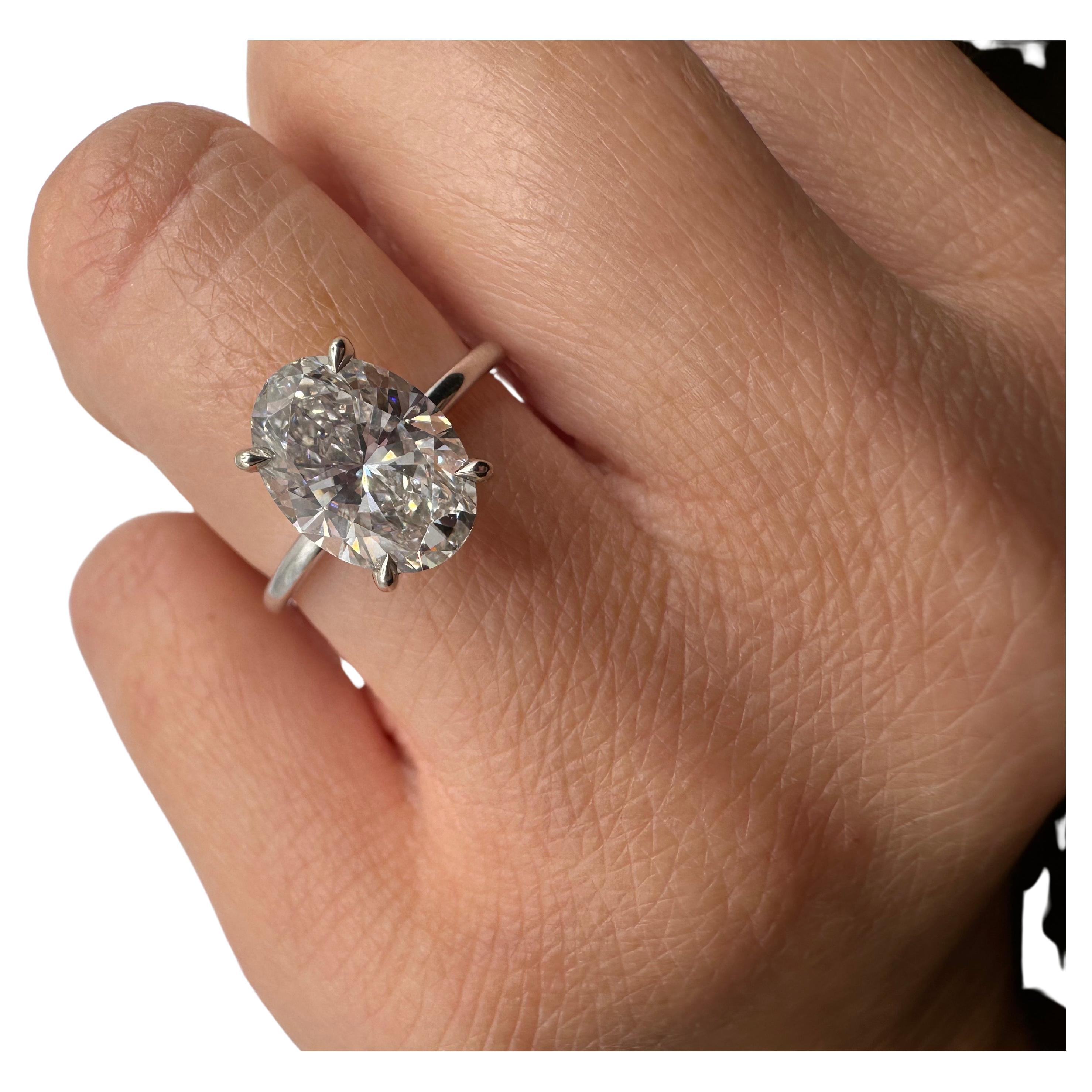 Stunning moissanite weighing 3 carats in simple classical setting 18KT white gold. Wll come with certificate of authenticity and nice packaging!



ABOUT US
We are a family-owned business. Our studio in located in the heart of Boca Raton at the