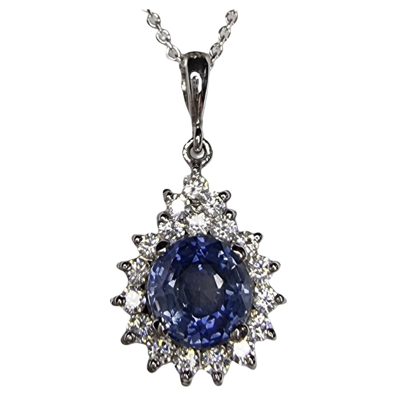 Introducing our captivating 3ct Natural Origin Blue Round Cut Sapphire Arch crown Pendant – a true embodiment of grace and sophistication. At the heart of this pendant lies a magnificent 1x7.2x6.8mm round natural origin blue sapphire, radiating an