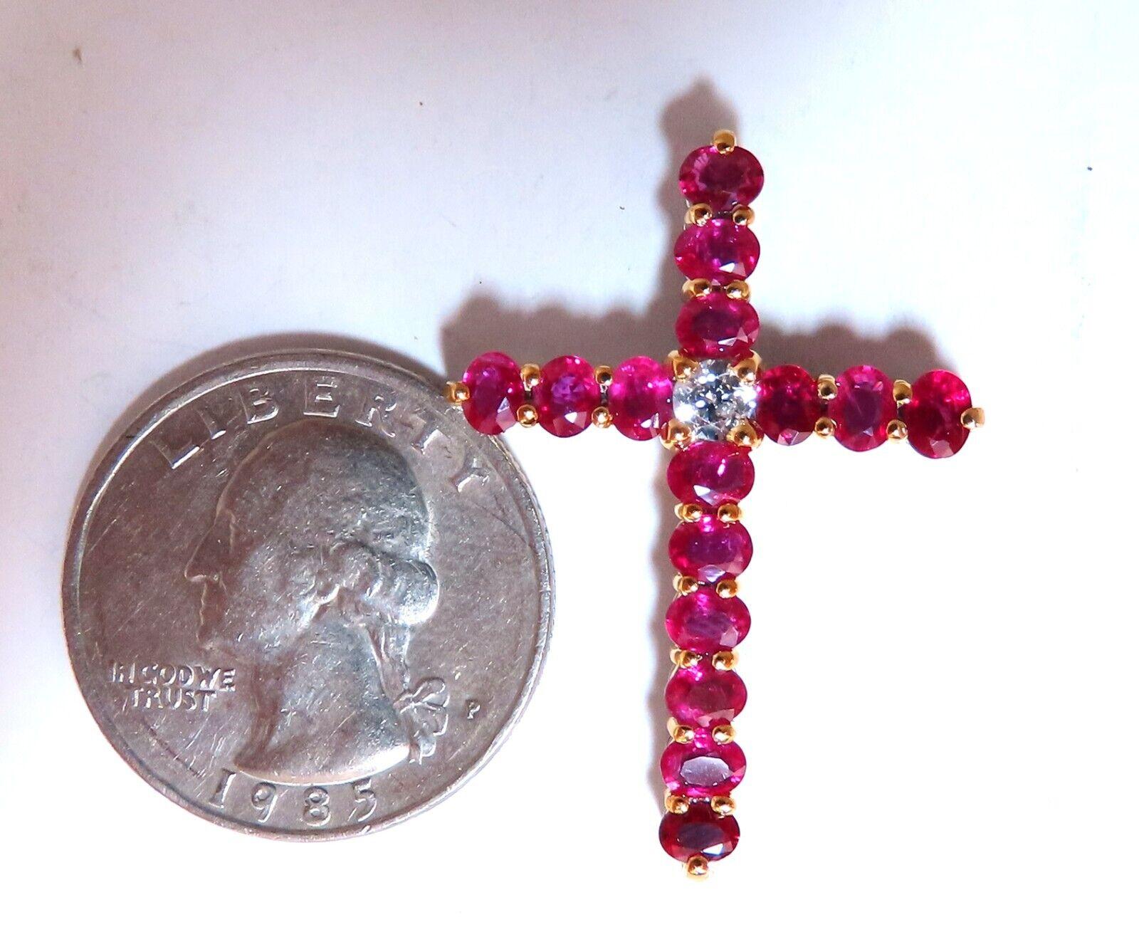 Natural Round Rubies & Diamond Cross.

.20ct. Brilliant Round Cut Natural Diamond

vs-2 clarity / H color

Natural 3ct Rubies

Brilliant oval, full cuts

clean clarity & transparent

Cross: 35 x 25mm

total weight: 4.9 grams.

18kt yellow