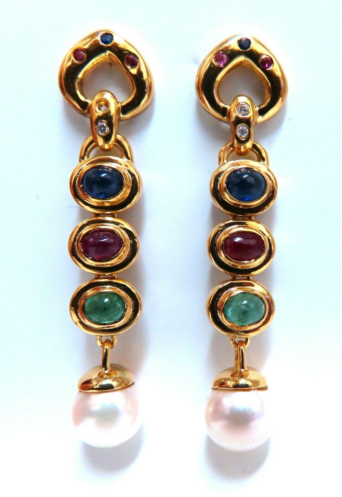 Dangling Cabochon Pearl clip earrings.

9mm Pearl

Fresh Water pearl, pink overtone

3cts Natural Ruby Sapphires & Emeralds.

14 karat yellow gold 11 grams

Overall earrings measure 2 inches

Comfortable Butterfly Post.

$4000 Appraisal to accompany