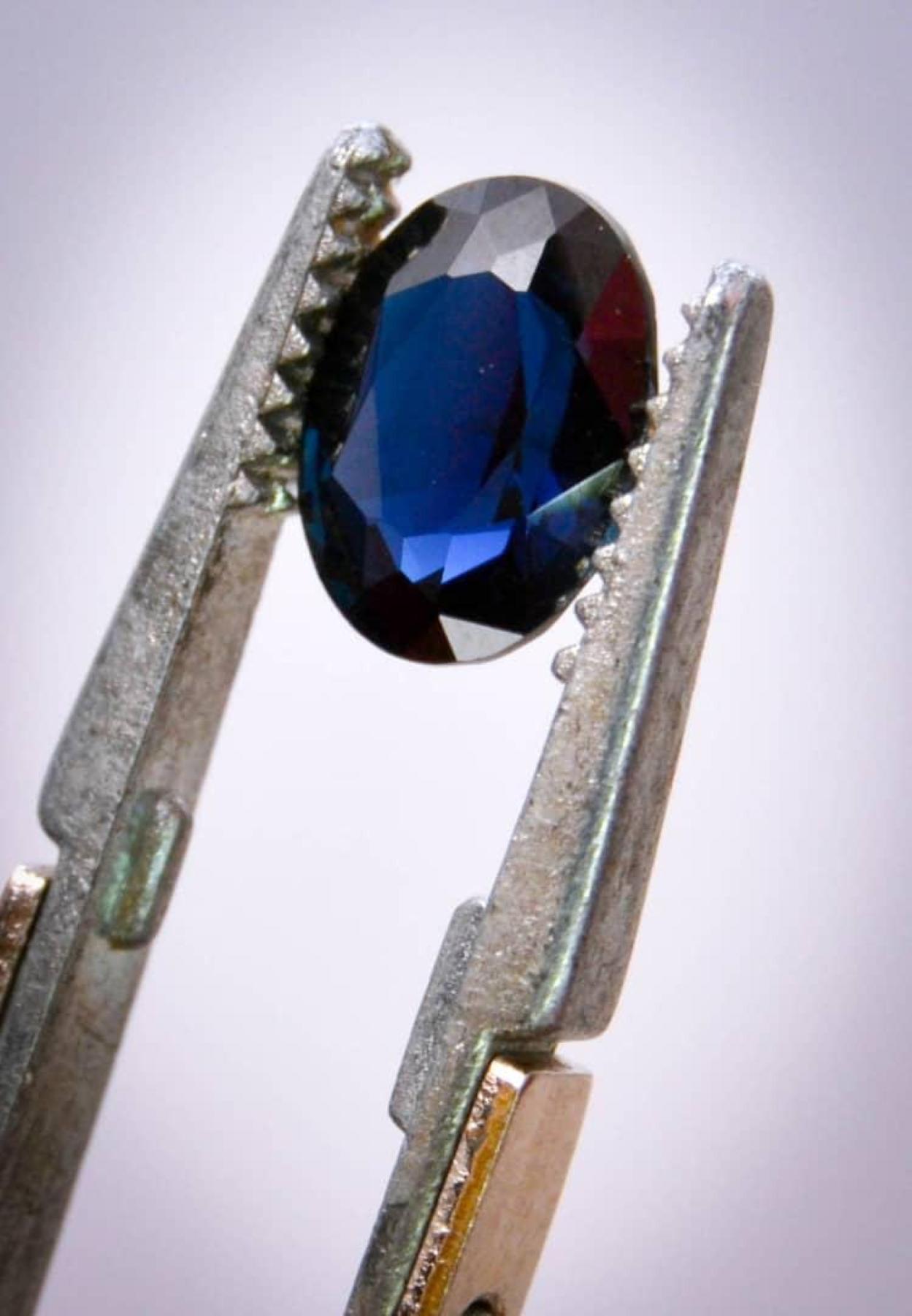 Custom Order: 2-4 week Delivery

3ct Oval Natural Deep Blue or Greenish Blue Sapphire and Diamond 18k White Gold  Ring

This ring features an impressive 3.0-carat oval-cut natural greenish blue sapphire as its centerpiece, framed by two round