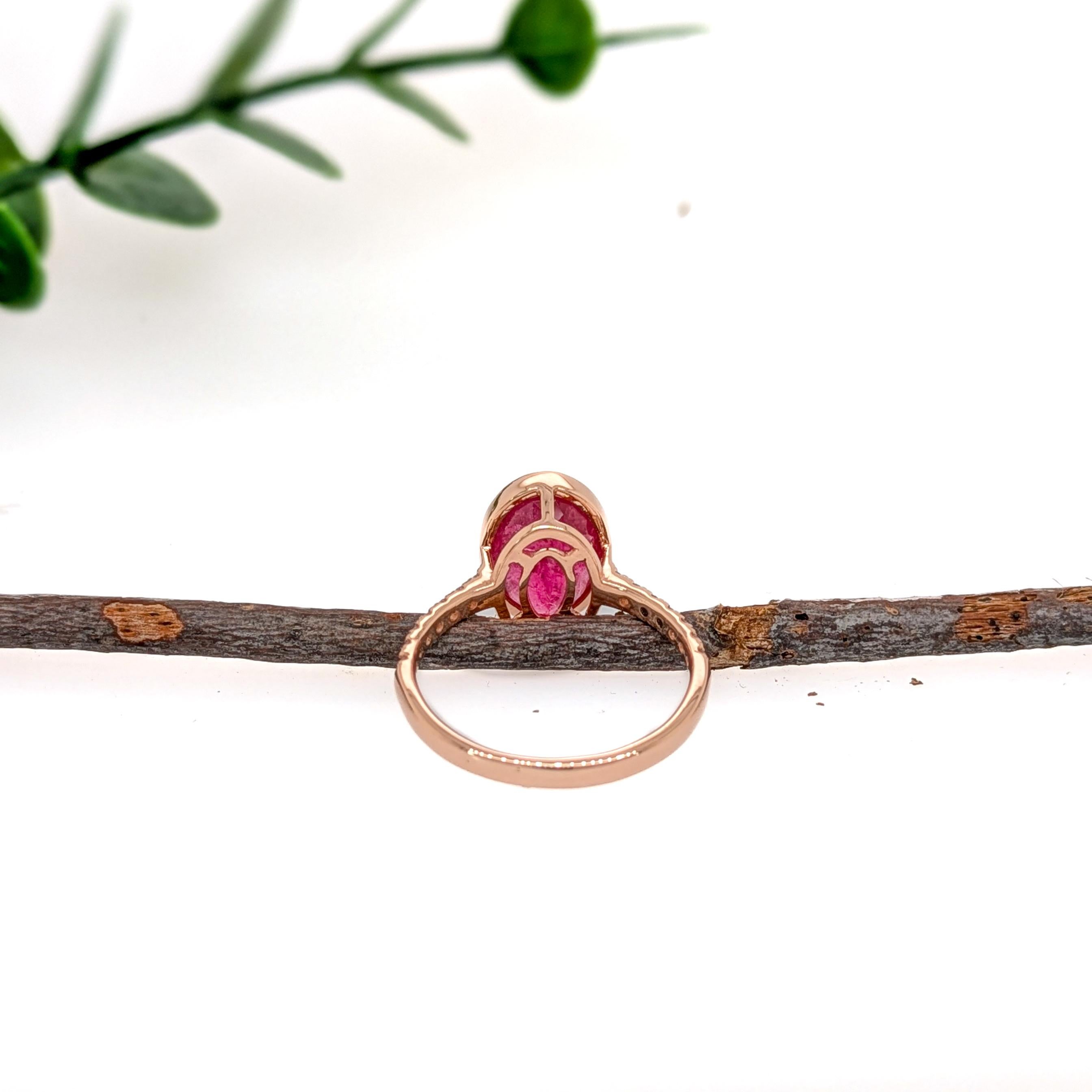 A stunning 3-carat Rubellite Tourmaline sits at the heart of this elegant 14K gold ring, surrounded by dazzling earth-mined diamond accents. Its vibrant pink-red hue makes it a standout piece, full of beauty and charm. This ring can be a beautiful