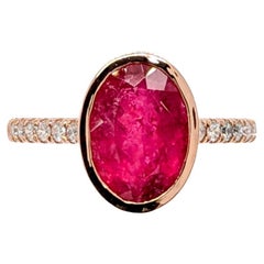 Anello con tormalina rubellite 3ct e accenti di diamanti naturali in oro 14K  OV 10x7mm