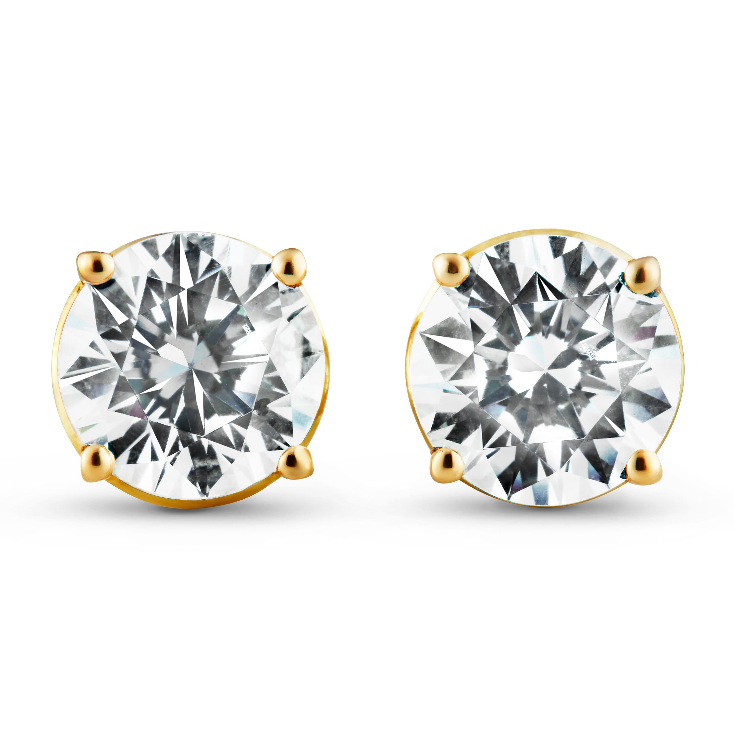 The No.1 Solitaire ear studs, with a total weight of 3 carats are designed to maximise the brilliance and luminosity of the diamonds. 

Our distinctive halo is carefully engineered to elevate the diamond, emphasising its size while strengthening and