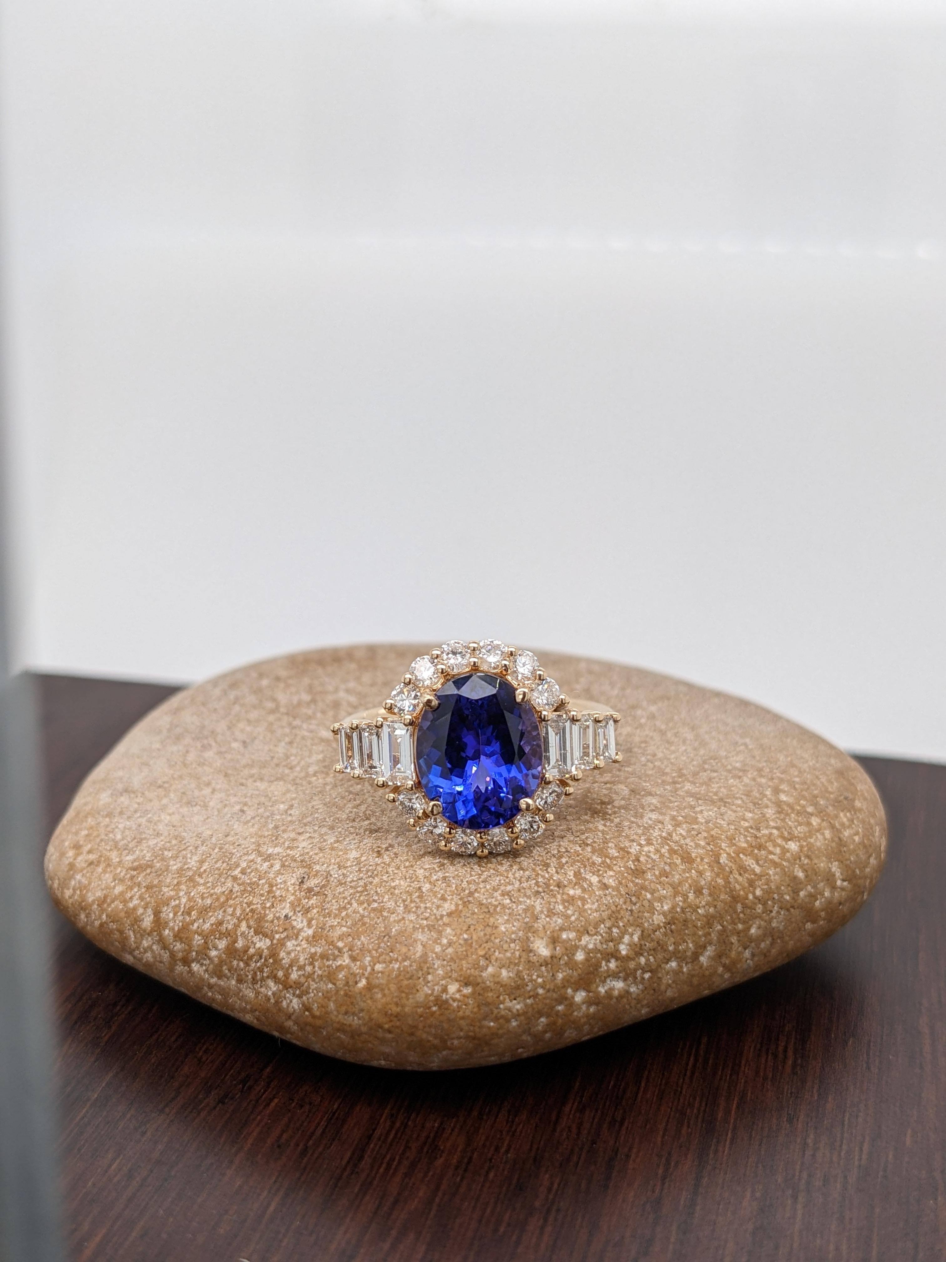 This stunning 3 carat oval cut tanzanite has a deep blue color with the perfect amount of purple flashes. An absolutely stunning ring for an engagement or any kind of statement! This NNJ Designs original ring setting features a mix of round and