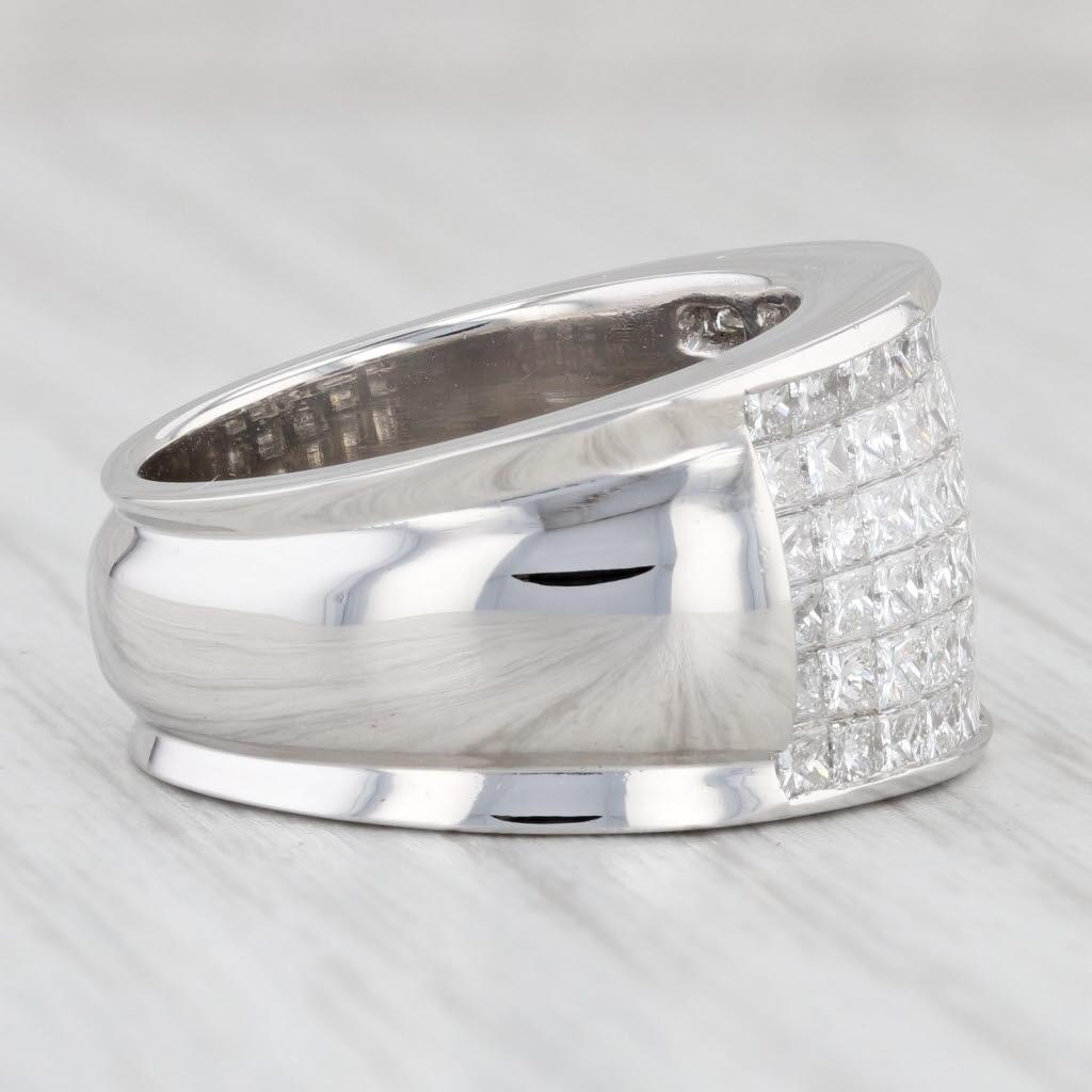 Gem: Natural Diamonds - 3 Total Carats, Princess Brilliant Cut, F - H Color, VS2 Clarity
Metal: Platinum
Weight: 25.5 Grams 
Stamps: Plat
Face Height: 12.6 mm 
Rise Above Finger: 4 mm
Band / Shank Width: 7.5 mm

This ring is a size 6 ¾ - 7. Please