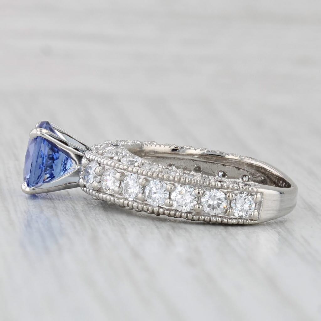 Informationen zu Edelsteinen:
- Natürlicher Tansanit -
Karat - 1,94ct (8 mm)
Schliff - Rundbrillant
Farbe - Lila
Behandlung - Beheizt

- Natürliche Diamanten -
Karat gesamt - 1.66ctw
Schliff - Rundbrillant
Farbe - F - G
Klarheit - VS2 - I2

Metall: