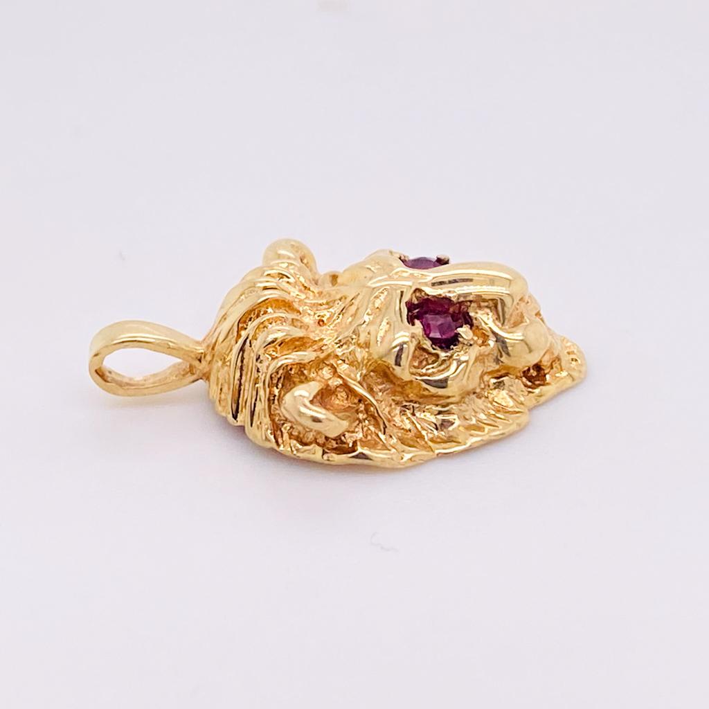gold lion pendant with ruby eyes