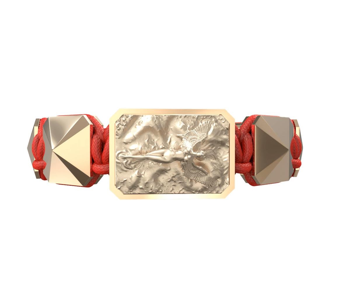 I Love Me bracelet with ceramic and sculpture finish cover in 18k Yellow Gold complemented with a red coloured cord.
The Ceramic finishes are platinum, yellow gold, rose gold, black and white ceramic 
The Base is the surface on which the feeling