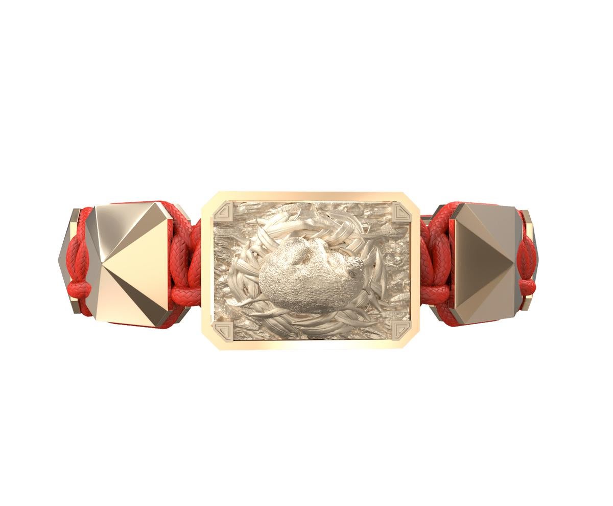 I Love My Baby bracelet with ceramic and sculpture finished in 18k Rose Gold complemented with a red coloured cord.  A baby Koala rests in his peaceful nest.  Expressing caring and protection of the family. 
The Ceramic finishes are platinum, yellow