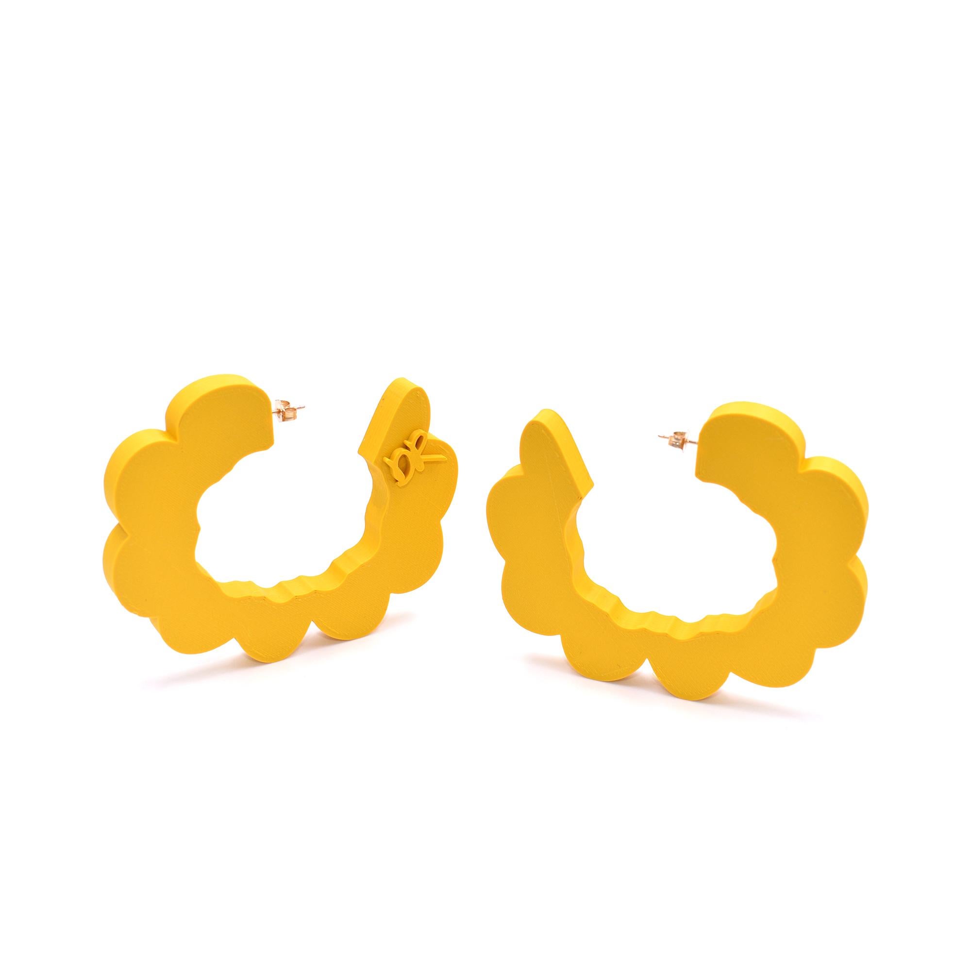 Can we pretend? These cloud shaped hoop earrings are 3d printed with premium PLA plastic
and finished with branded hypoallergenic gold plated posts. Matte, leather like finish. Very lightweight and super easy to style!

As seen on Megan Mckenna and