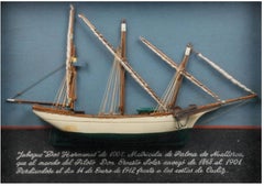 3D ship sculpture in ebonized frame