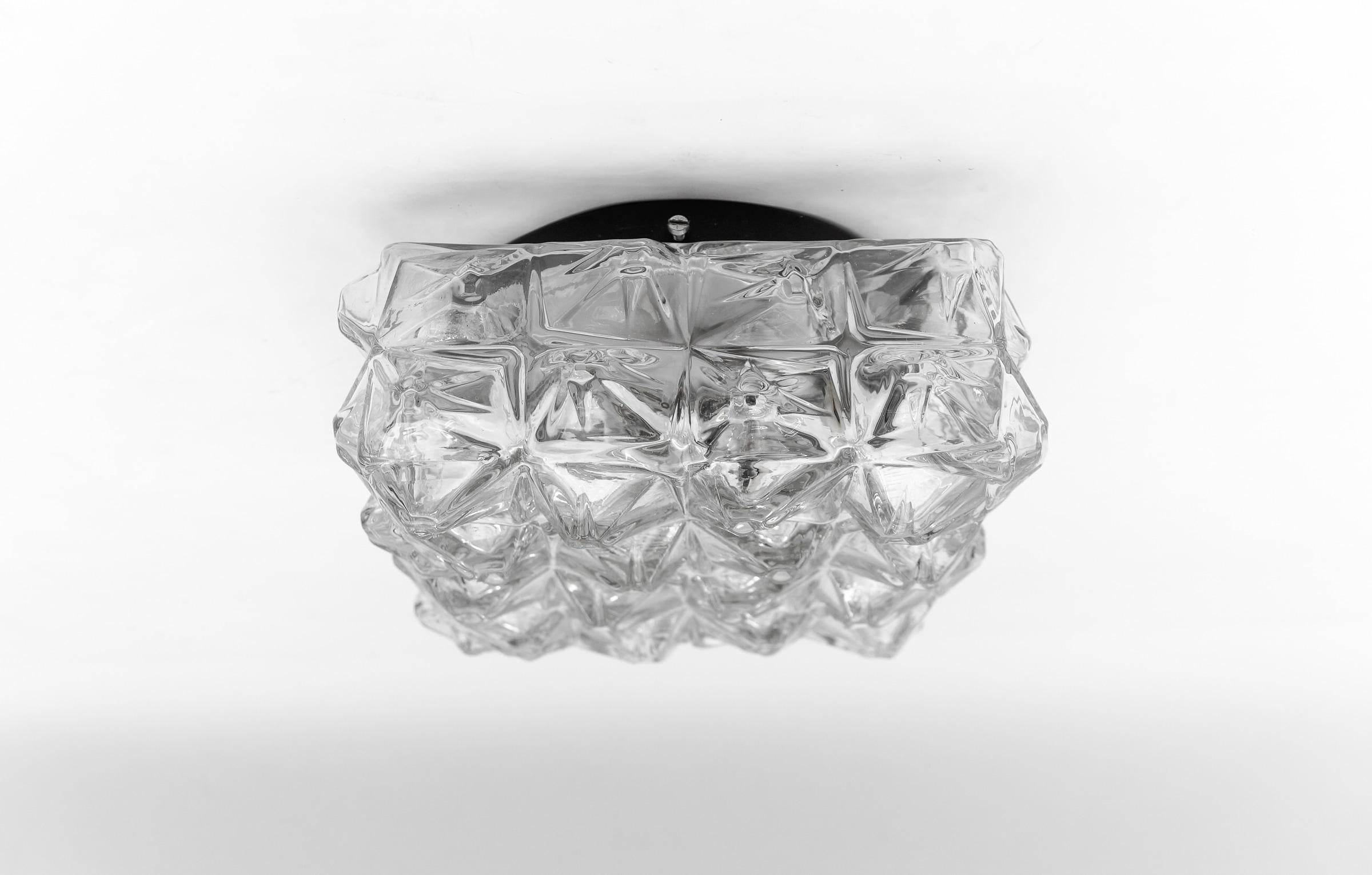 3D Square Geometric Glass Flush Mount Light, Germany 1960s

The fixture need 1 x E27 standard bulb with 60W max.

Light bulbs are not included.

It is possible to install this fixture in all countries (US, Australia, Asia, UK, Europe,..)