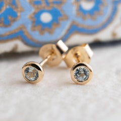 3mm Blue Topaz Gold Plated Sterling Silver Stud Earrings