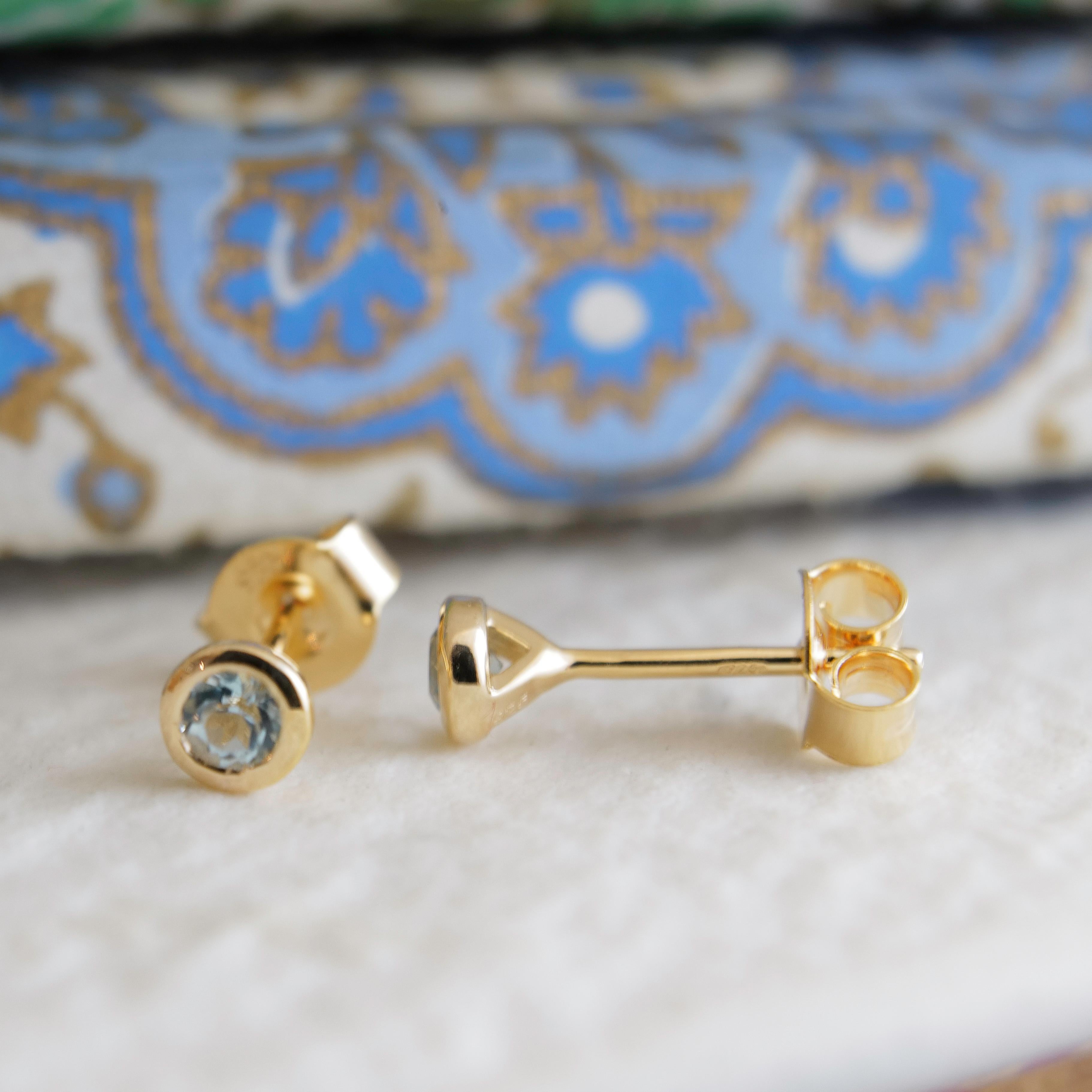 Round Cut 3mm Blue Topaz Gold Plated Sterling Silver Stud Earrings For Sale