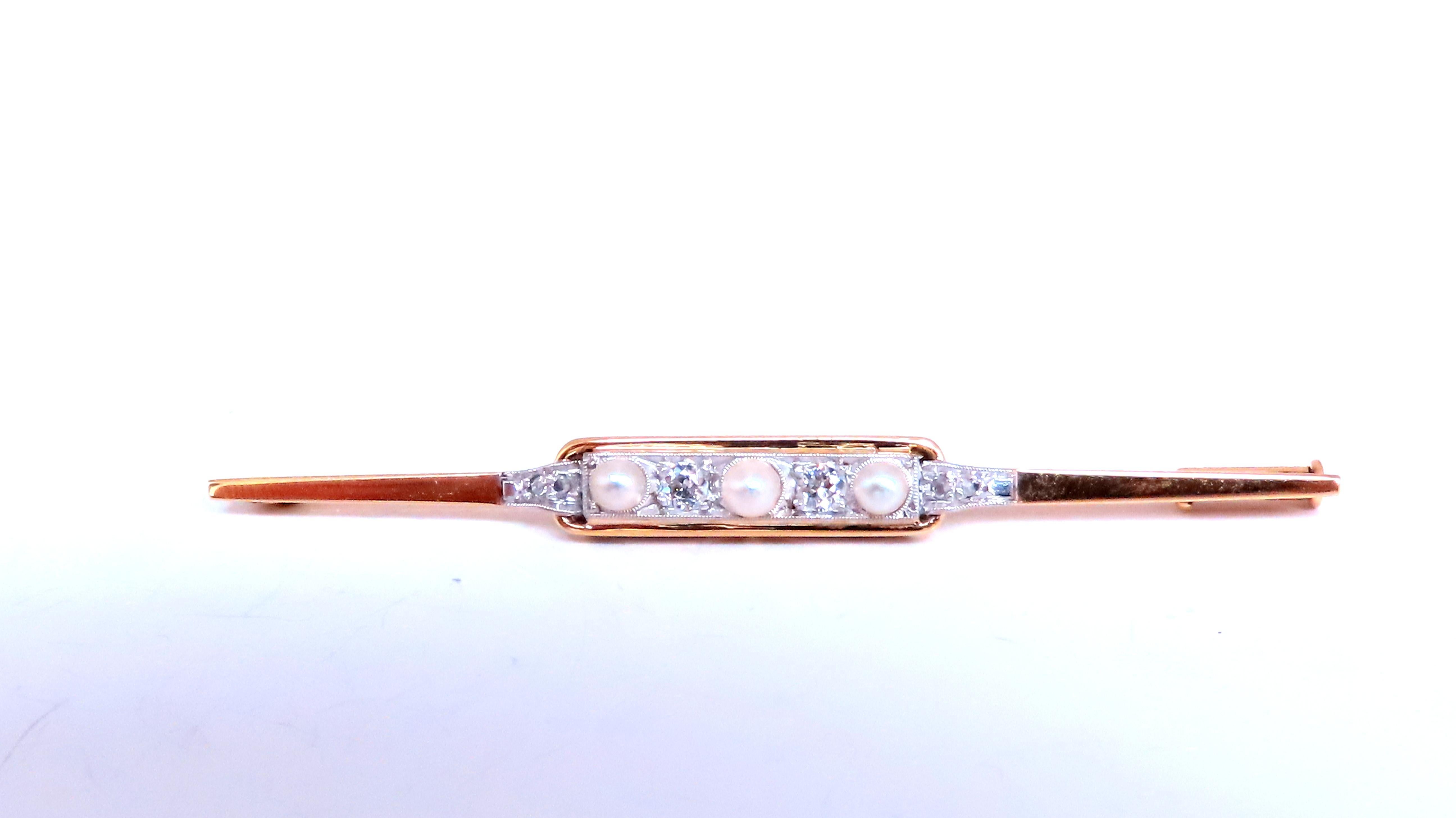 0.30ct natural diamonds bar vintage pin 
g-color vs-2 clarity 
3mm freshwater pearl 
3.8 grams 
14kt yellow gold 
2.5 inches long