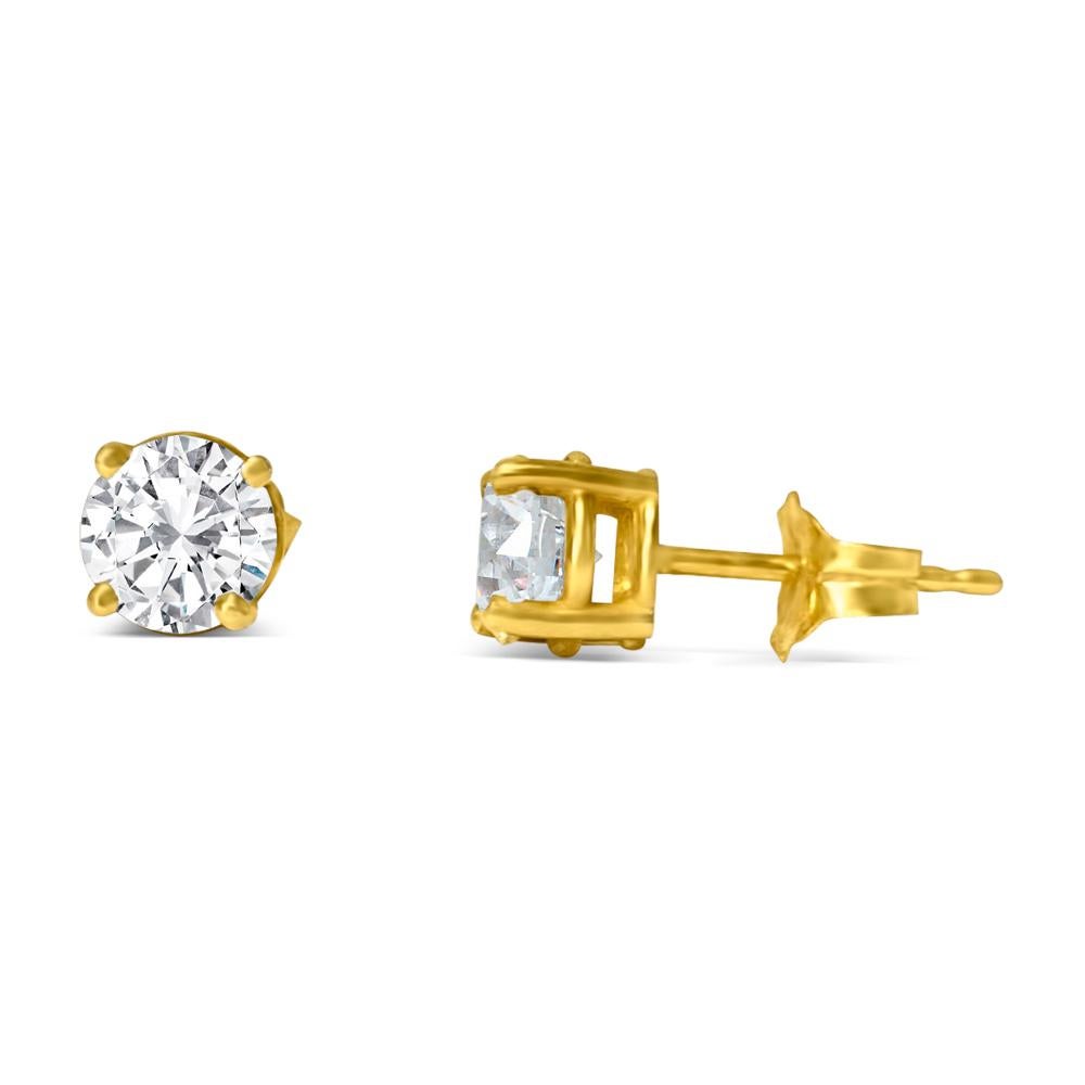 Metal: 14k yellow gold. 
Diamonds: 3mm diamonds. 0.25 cwt. VVS clarity. H color. Round brilliant cut diamonds set in 4 prong studs. Butterfly push back studs.  100% natural earth mined diamonds. 

Beautiful shine and luster. Unisex diamond studs.