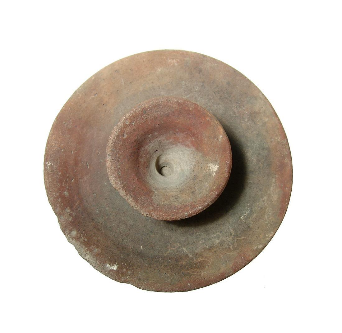 Candle holder, Roman-Byzantine, c. 3rd - 7th Century AD, with red-slipped surfaces and deposits indicative of age. Ex Baron collection, Southern California. Museum Quality. 