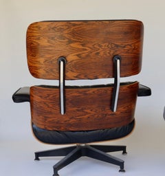 Fauteuil de salon et repose-pieds Eames en bois de rose brésilien pour Herman Miller