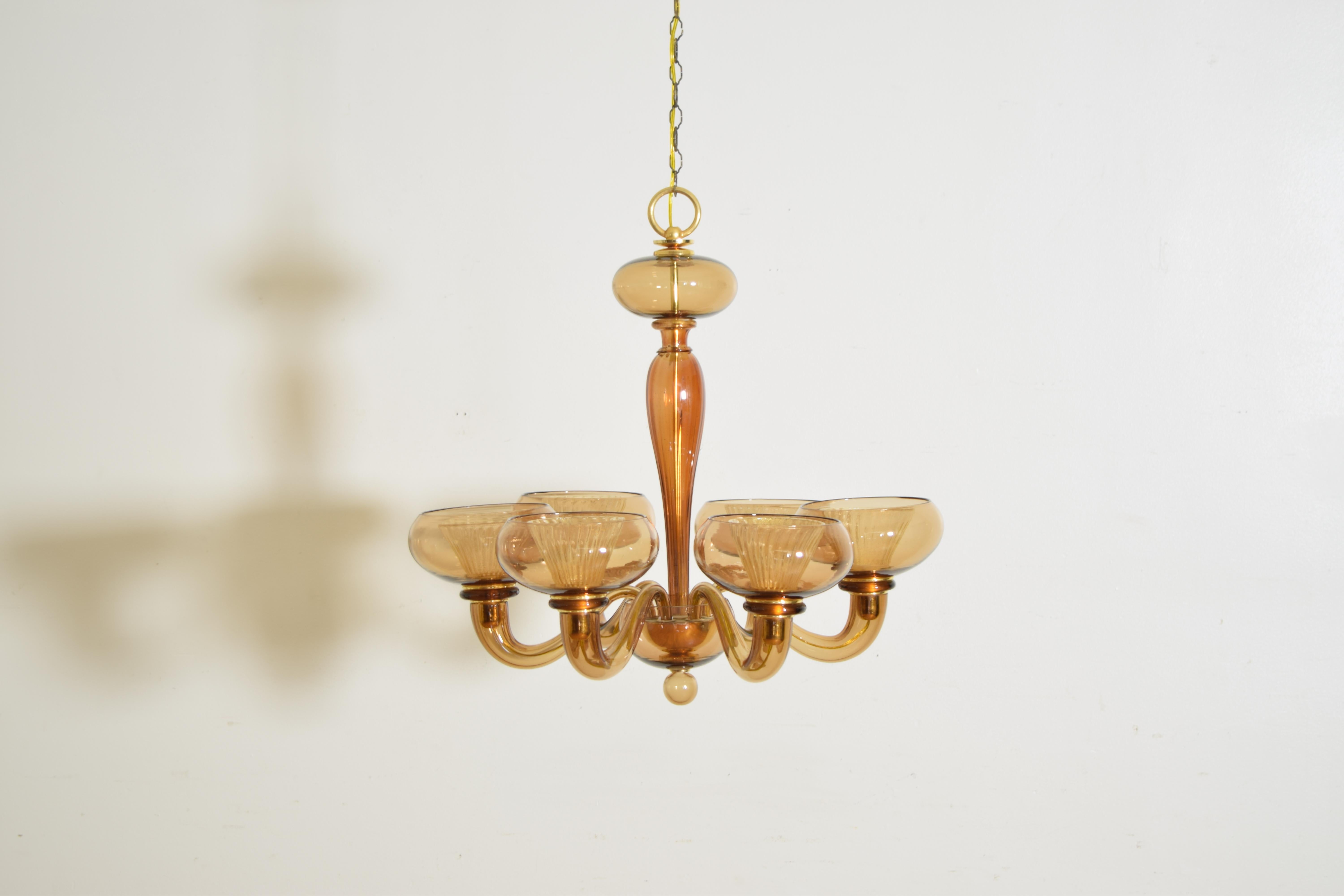 Hand Fired Smoke Gold Murano glass chandelier with Six Lights and Brass Internal Structure.  The six coupe style lights are lined with an inner glass cup to create a unique ambience and hold a smaller bulb.
