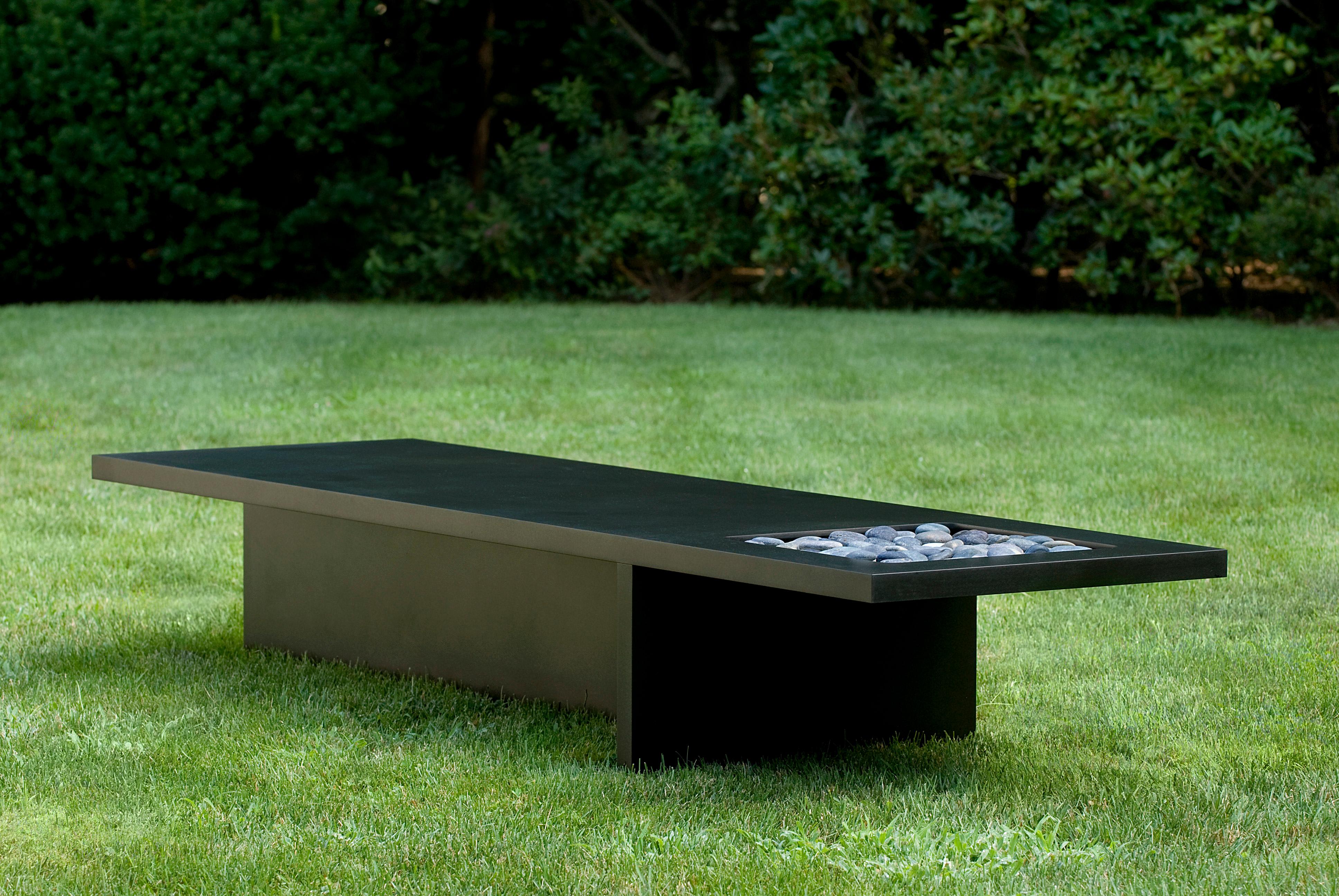 Designed for either interior or exterior use, the versatile 3SR bench was created to be multifunctional. The simple, slab construction gives a monolithic presence to the bench, and is reminiscent of ancient stone assemblages. Constructed of 1.5