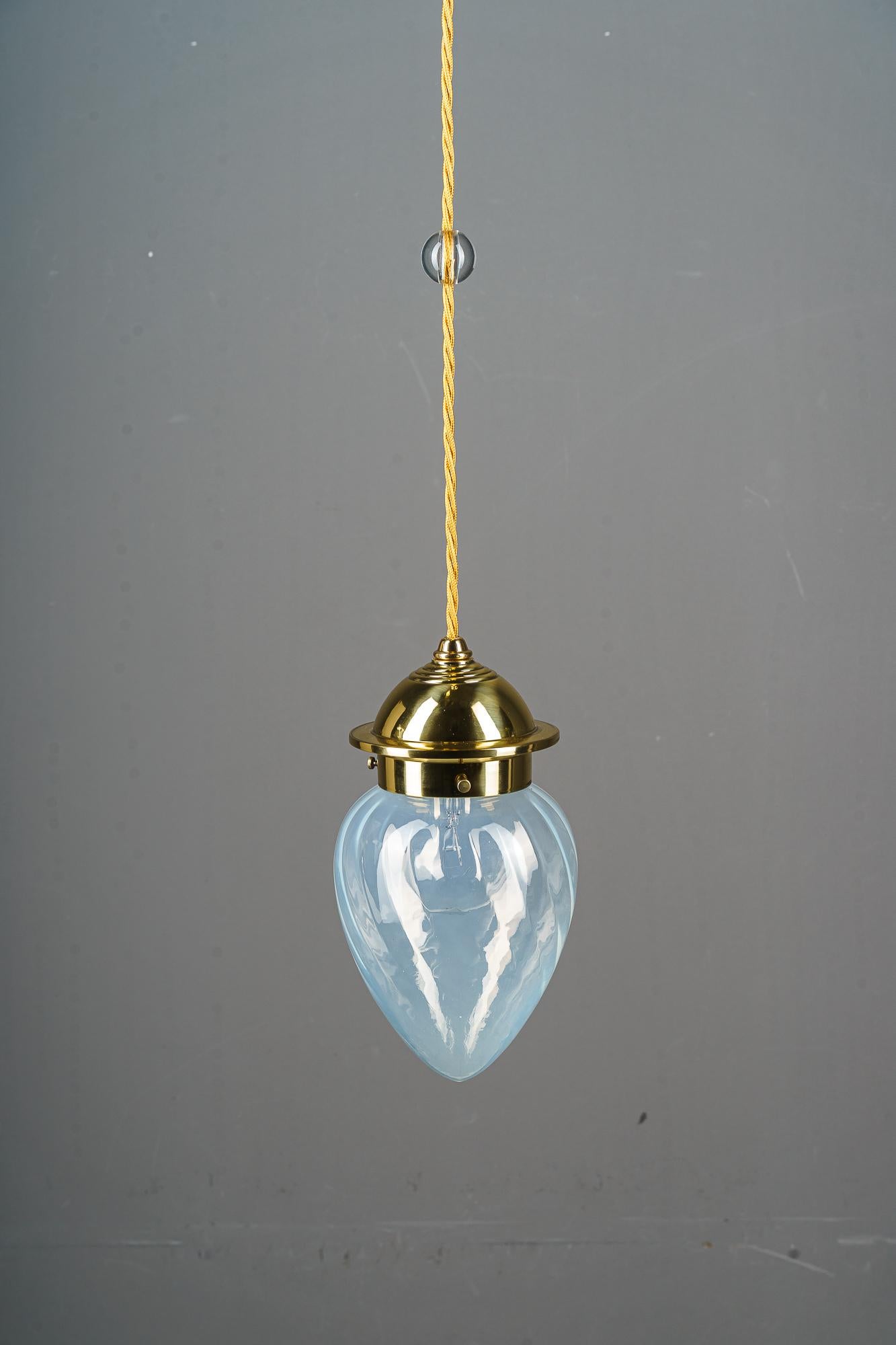3x art deco pendant with blue opaline glass shades vienna around 1920s
Brass polished and stove enameled
Original opaline glass shade