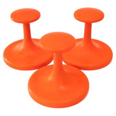 3x Orange plastic hooks around 1970s