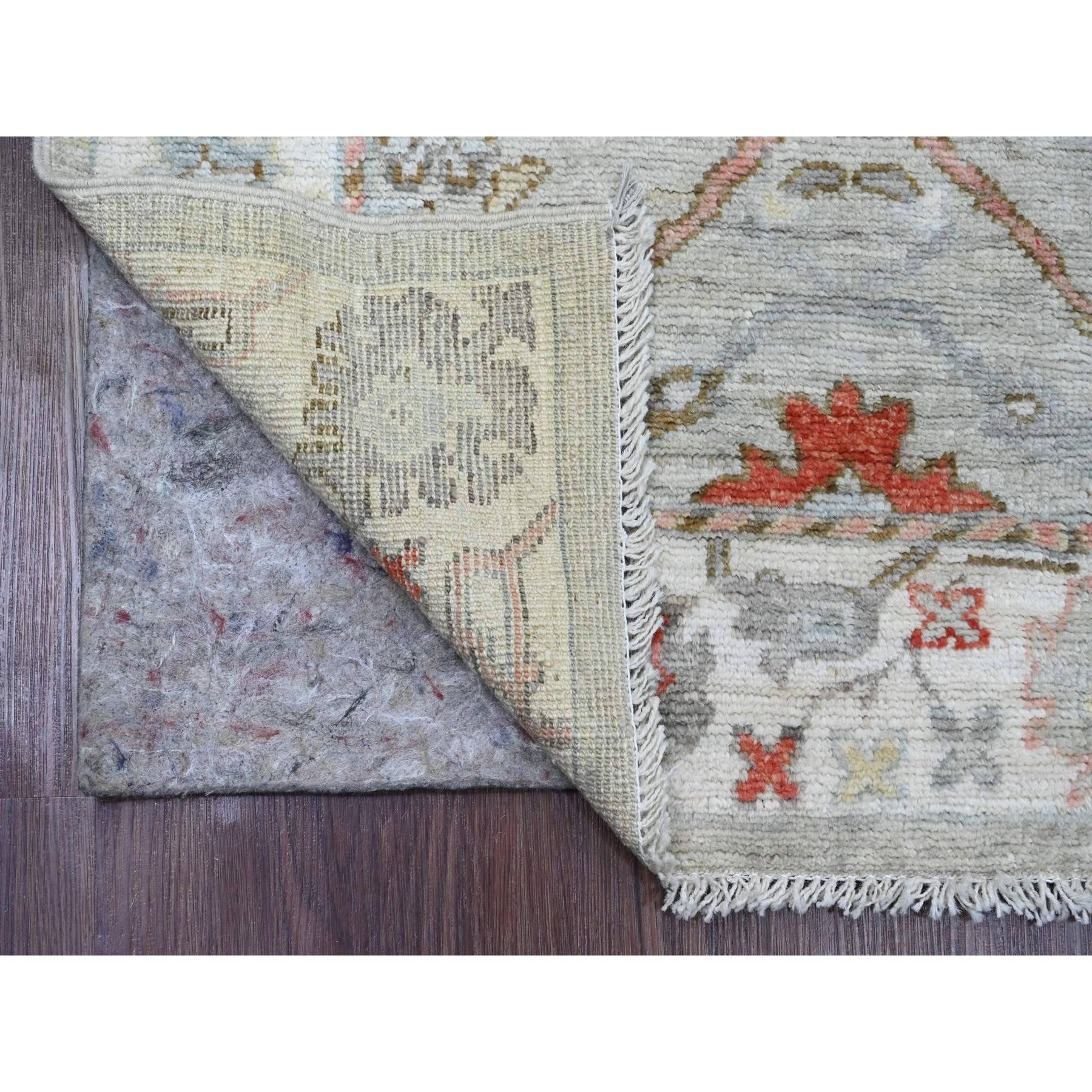 Medium Gray, Afghan Angora Oushak with Floral Pattern, Hand Knotted, Vegetable Dyes, 100% Wool, Runner, Oriental Rug
Primary materials: Wool
Latex: No Pile 
height: 0.25 Inches
Style: Transitional
Primary color: Grey
Secondary colors: Red, Pink,