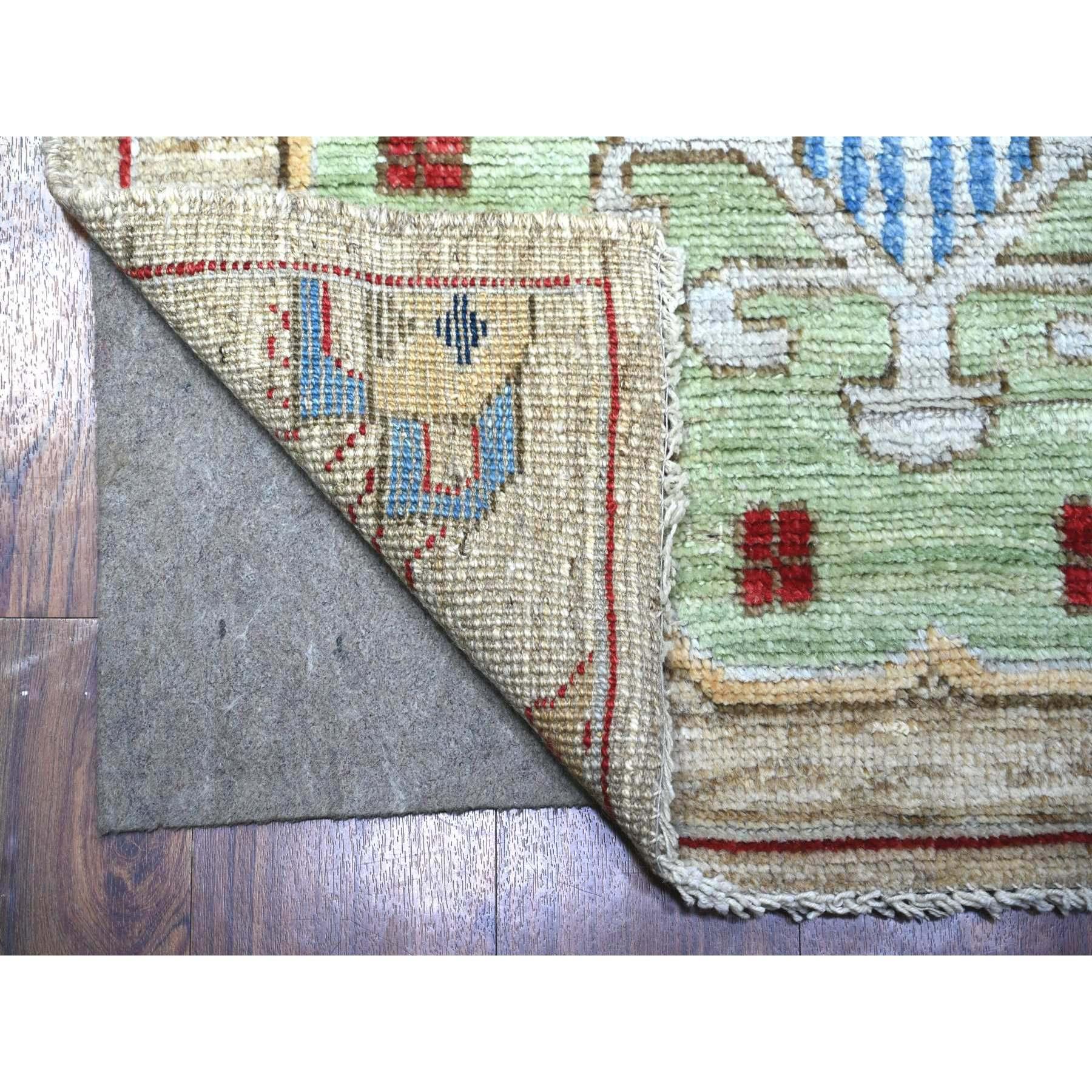 This is a truly genuine one-of-a-kind Colorful, Hand Knotted Anatolian Village Inspired with Triangles Design, Natural Dyes Soft Wool Oriental Rug. It has been Knotted for months in the centuries-old weaving craftsmanship techniques by expert